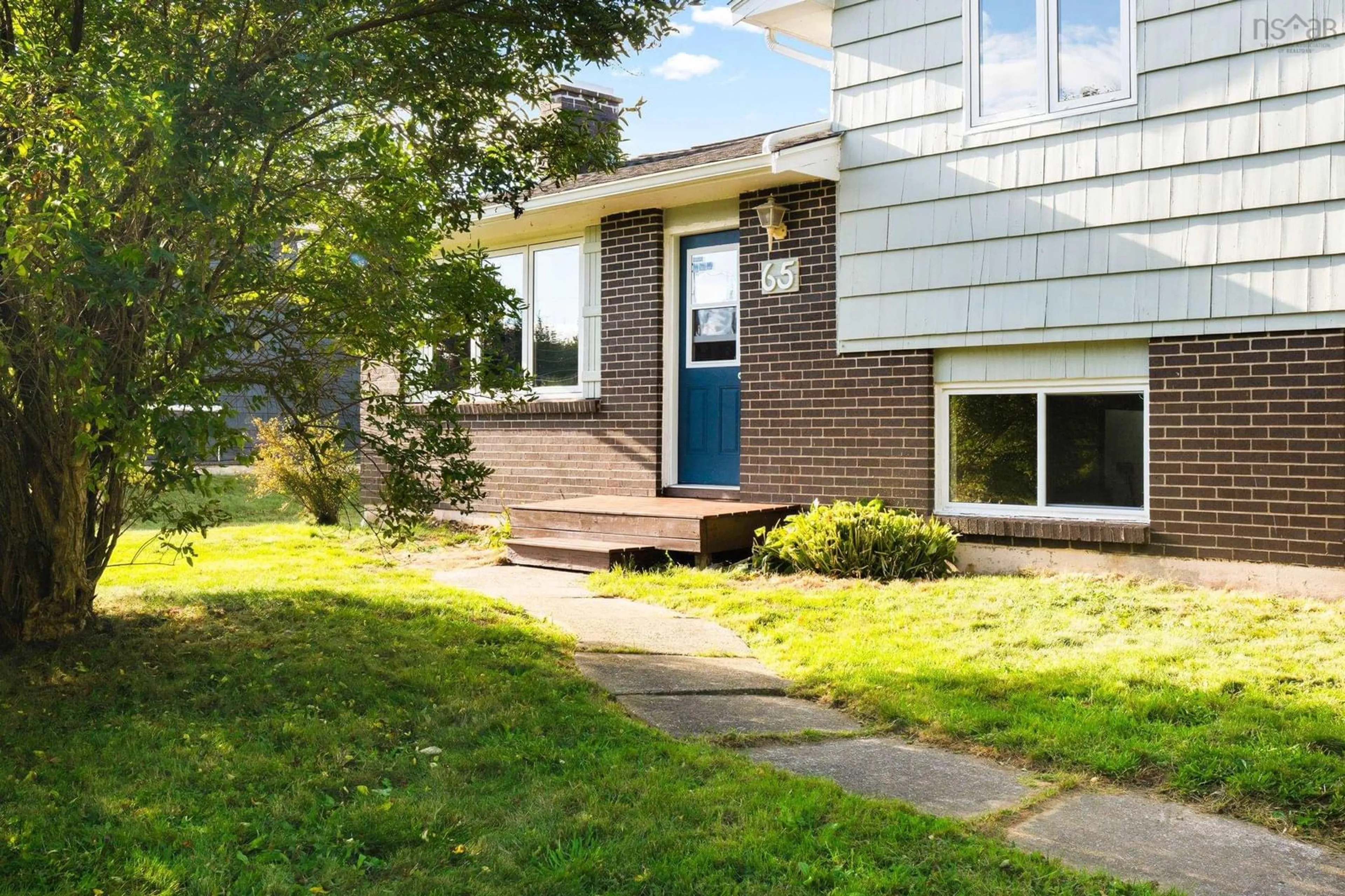Home with brick exterior material, street for 65 Marjorie Dr, West Porters Lake Nova Scotia B3E 1N2