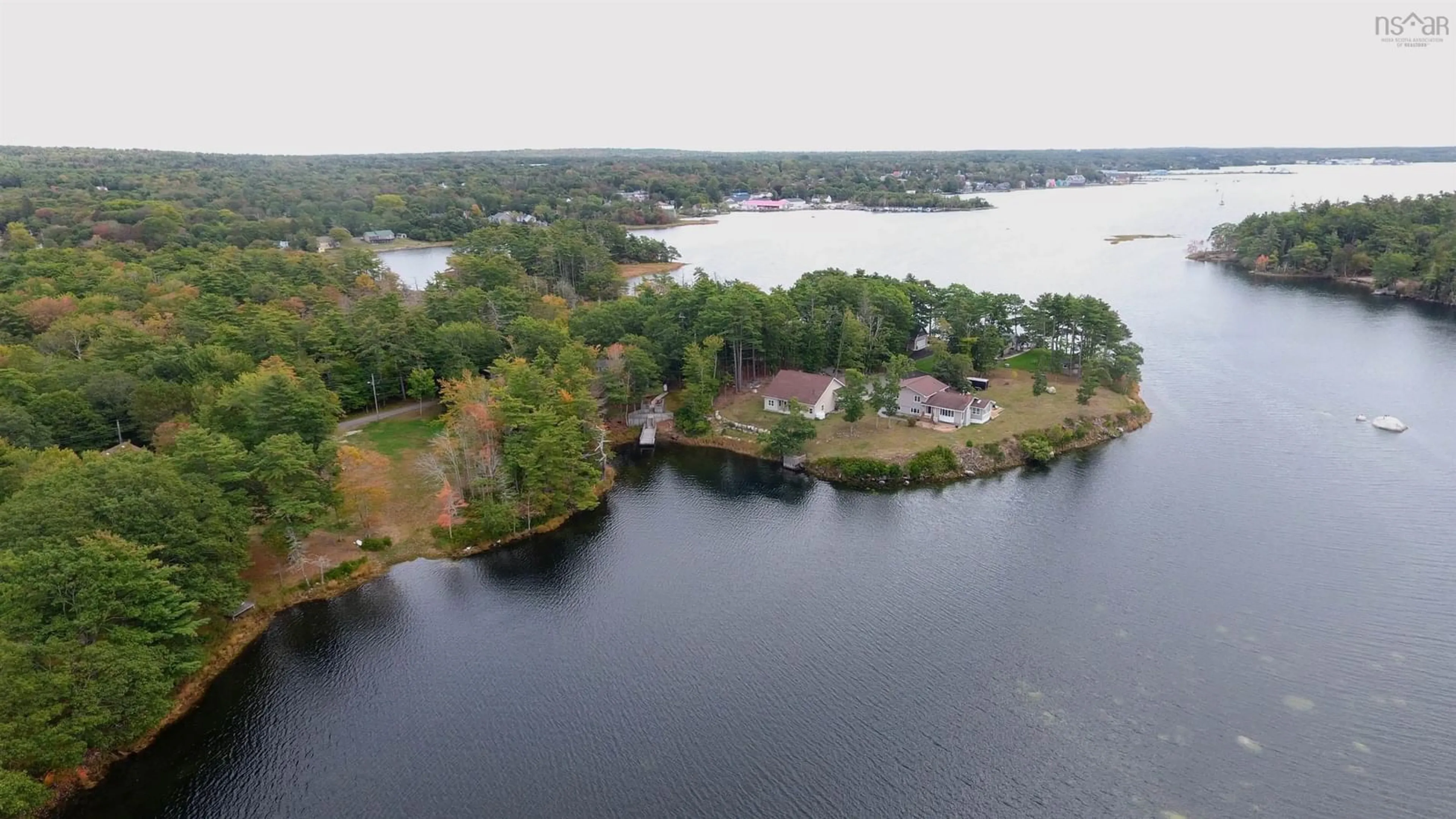 A pic from outside/outdoor area/front of a property/back of a property/a pic from drone, water/lake/river/ocean view for 74 Mcgills Point Lane, Shelburne Nova Scotia B0T 1W0