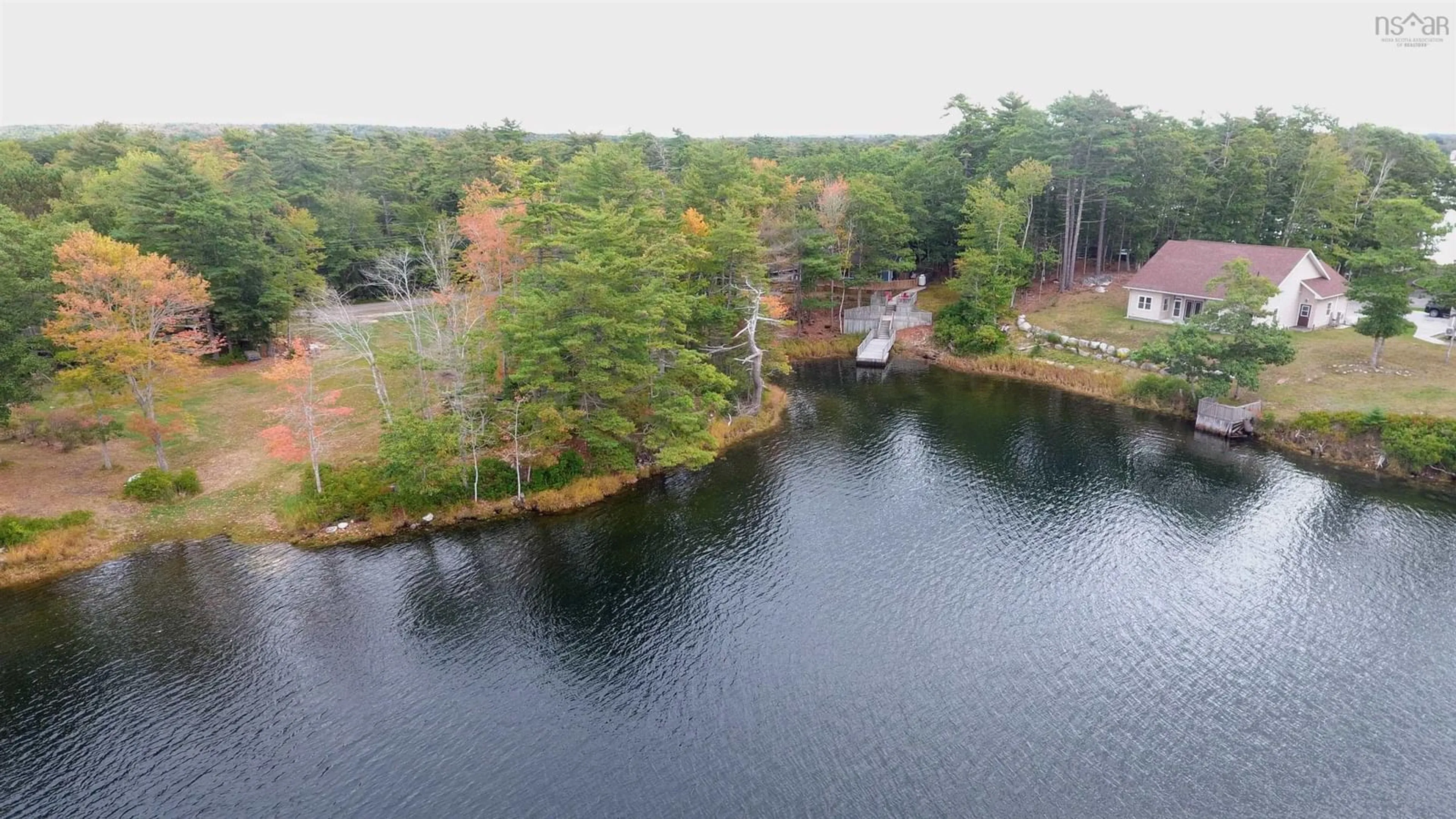 A pic from outside/outdoor area/front of a property/back of a property/a pic from drone, water/lake/river/ocean view for 74 Mcgills Point Lane, Shelburne Nova Scotia B0T 1W0