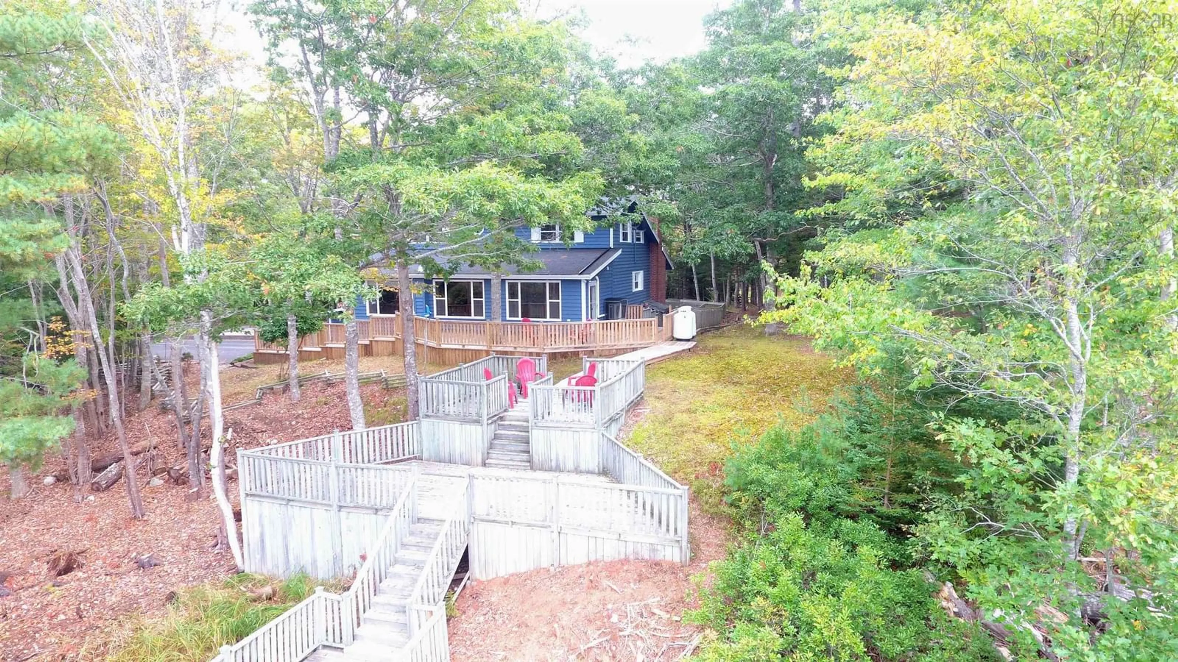 A pic from outside/outdoor area/front of a property/back of a property/a pic from drone, water/lake/river/ocean view for 74 Mcgills Point Lane, Shelburne Nova Scotia B0T 1W0