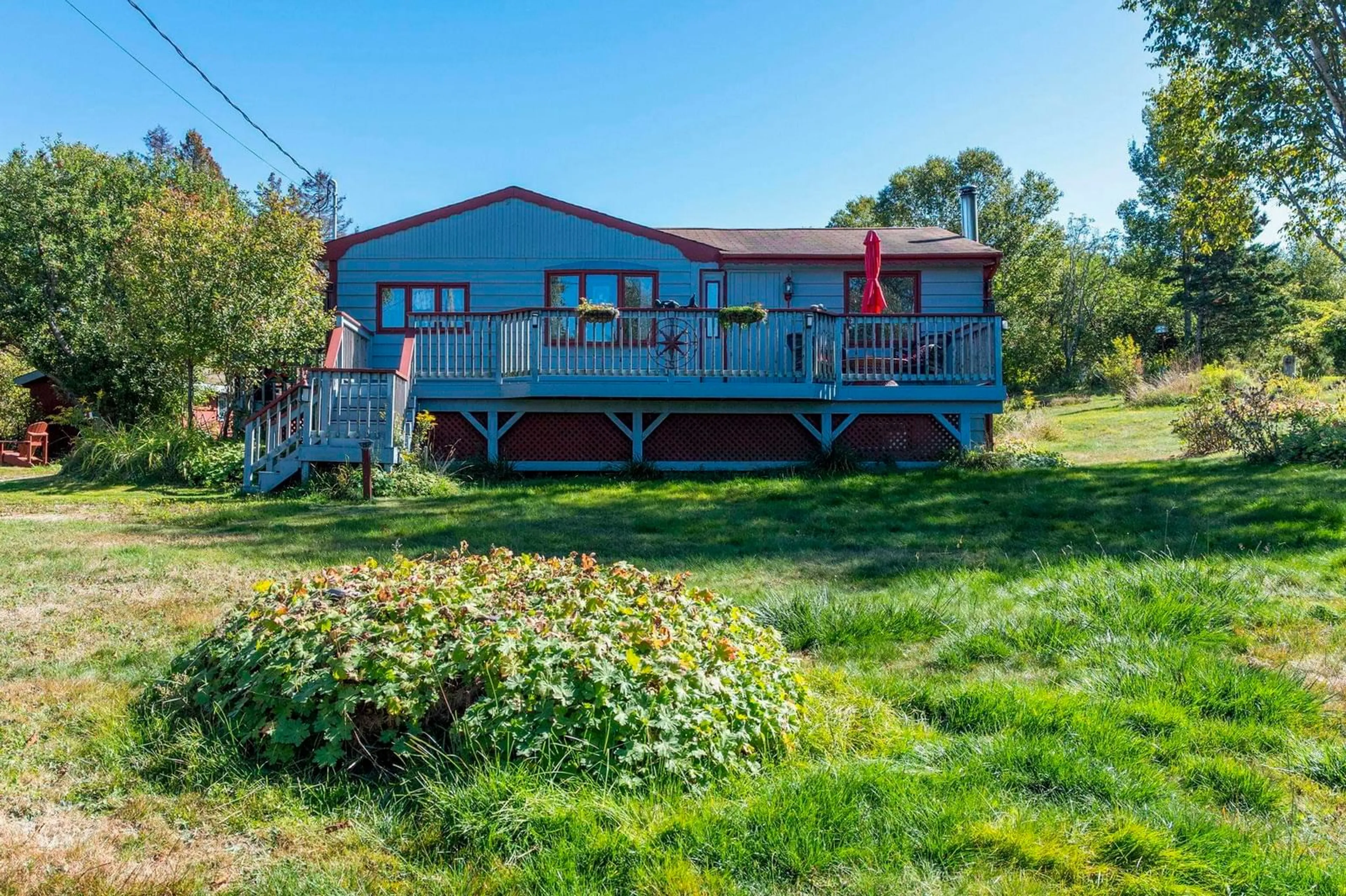 A pic from outside/outdoor area/front of a property/back of a property/a pic from drone, water/lake/river/ocean view for 5012 Highway 329, Blandford Nova Scotia B0J 0C2