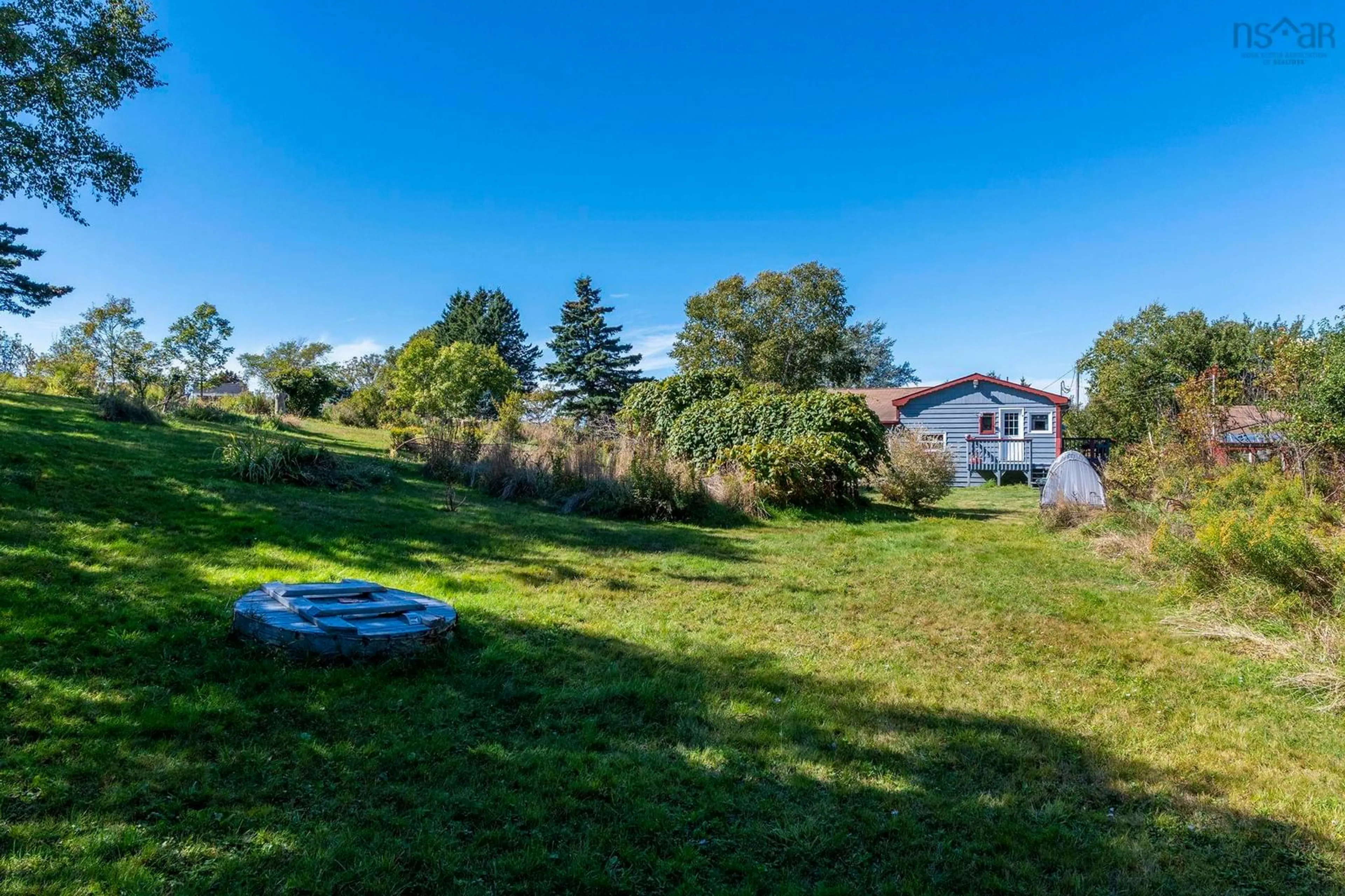 A pic from outside/outdoor area/front of a property/back of a property/a pic from drone, water/lake/river/ocean view for 5012 Highway 329, Blandford Nova Scotia B0J 0C2
