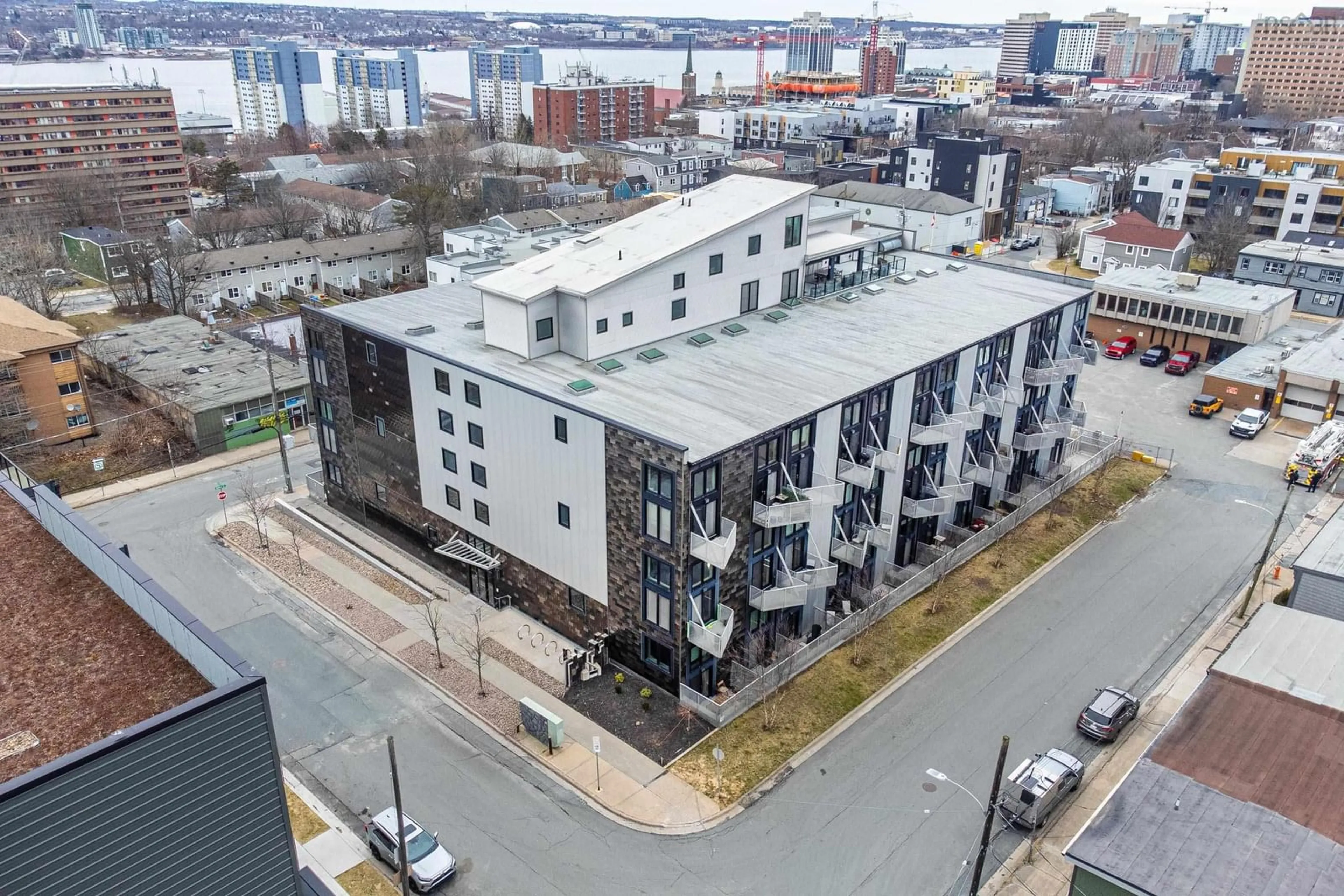A pic from outside/outdoor area/front of a property/back of a property/a pic from drone, city buildings view from balcony for 5662 Roberts St #313, Halifax Nova Scotia B3K 0E3