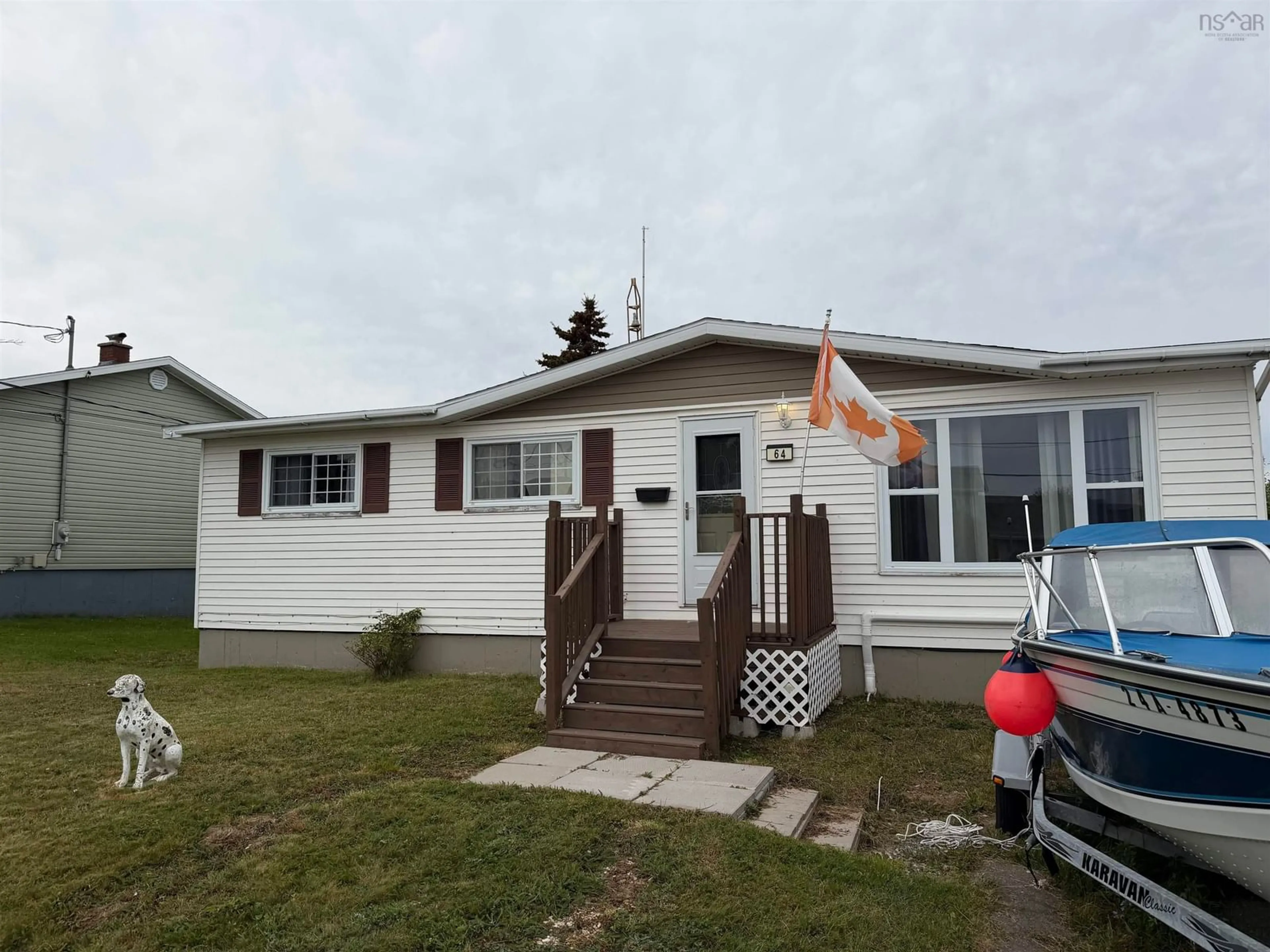 Home with vinyl exterior material, street for 64 Macnamara Drive, Glace Bay Nova Scotia B1A 6A7