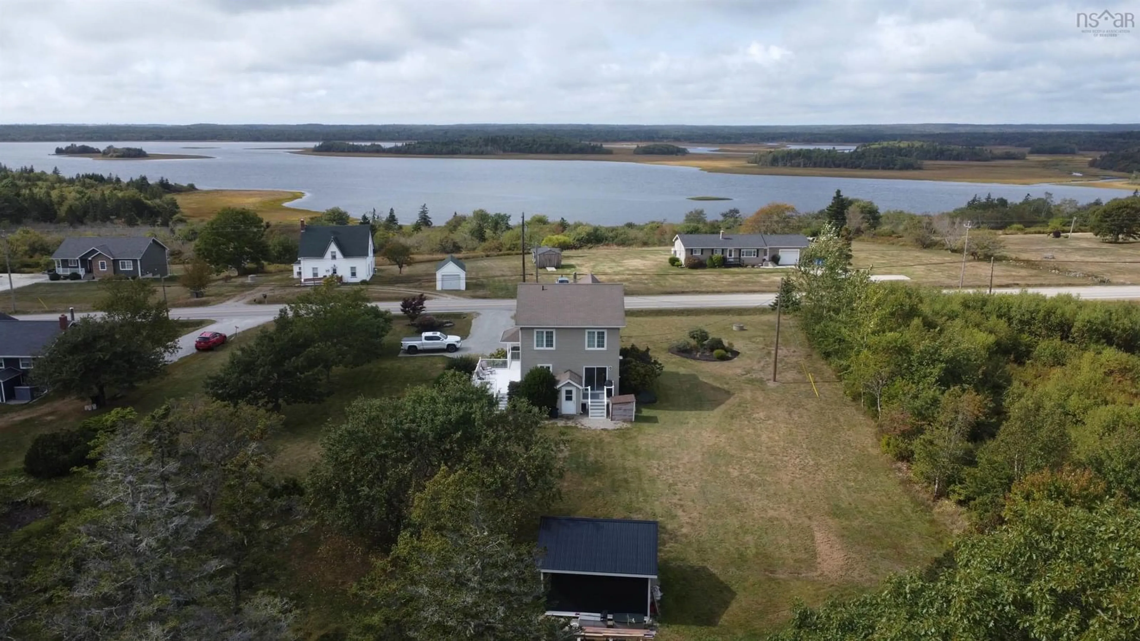 A pic from outside/outdoor area/front of a property/back of a property/a pic from drone, water/lake/river/ocean view for 3542 Highway 308, Hubbards Point Nova Scotia B0W 3M0