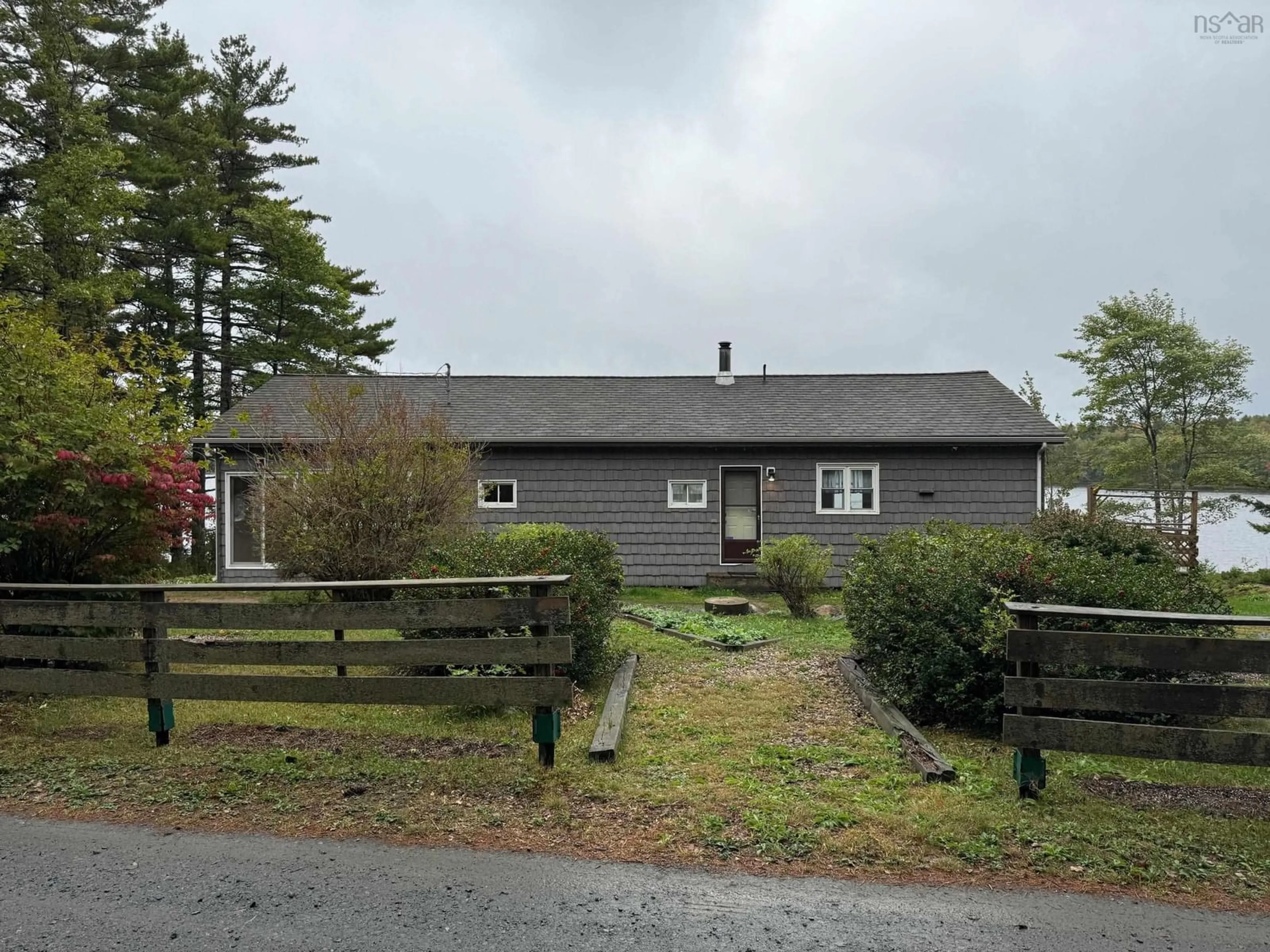 A pic from outside/outdoor area/front of a property/back of a property/a pic from drone, unknown for Pernette Lake Rd #100, Lake Centre Nova Scotia B0R 1G0