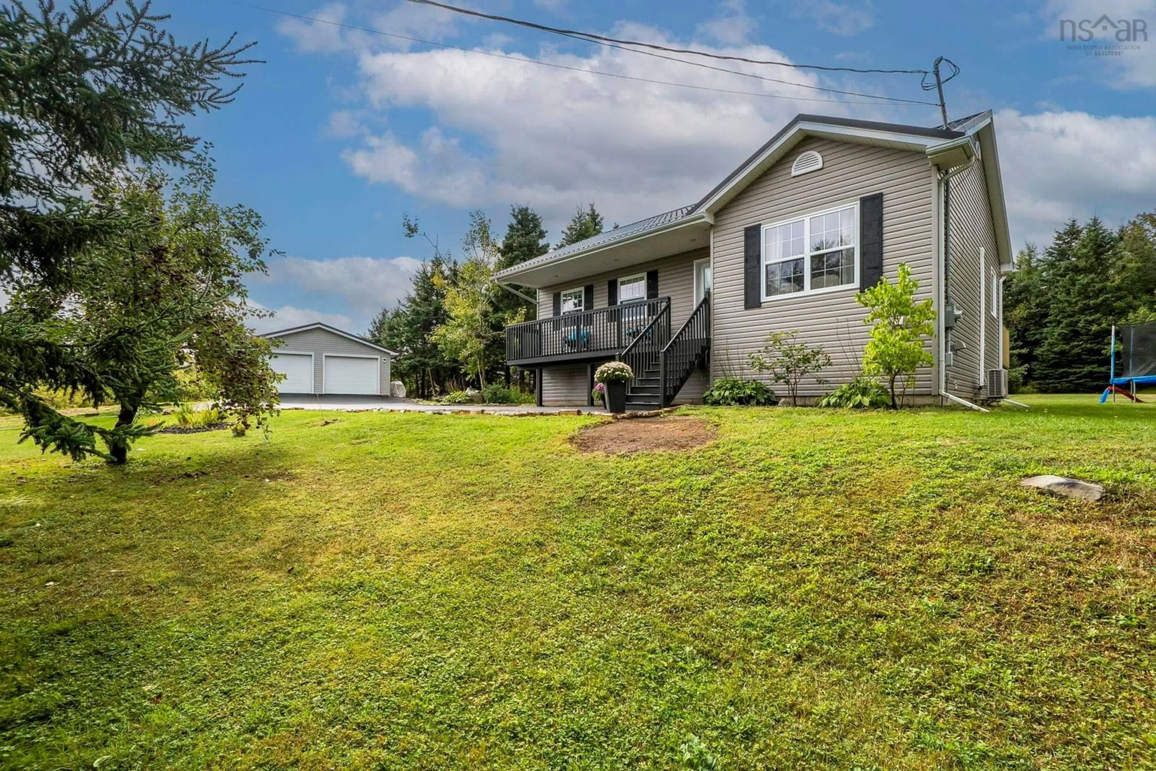 A pic from outside/outdoor area/front of a property/back of a property/a pic from drone, water/lake/river/ocean view for 2266/2270 Cow Bay Rd, Cow Bay Nova Scotia B3G 1K8