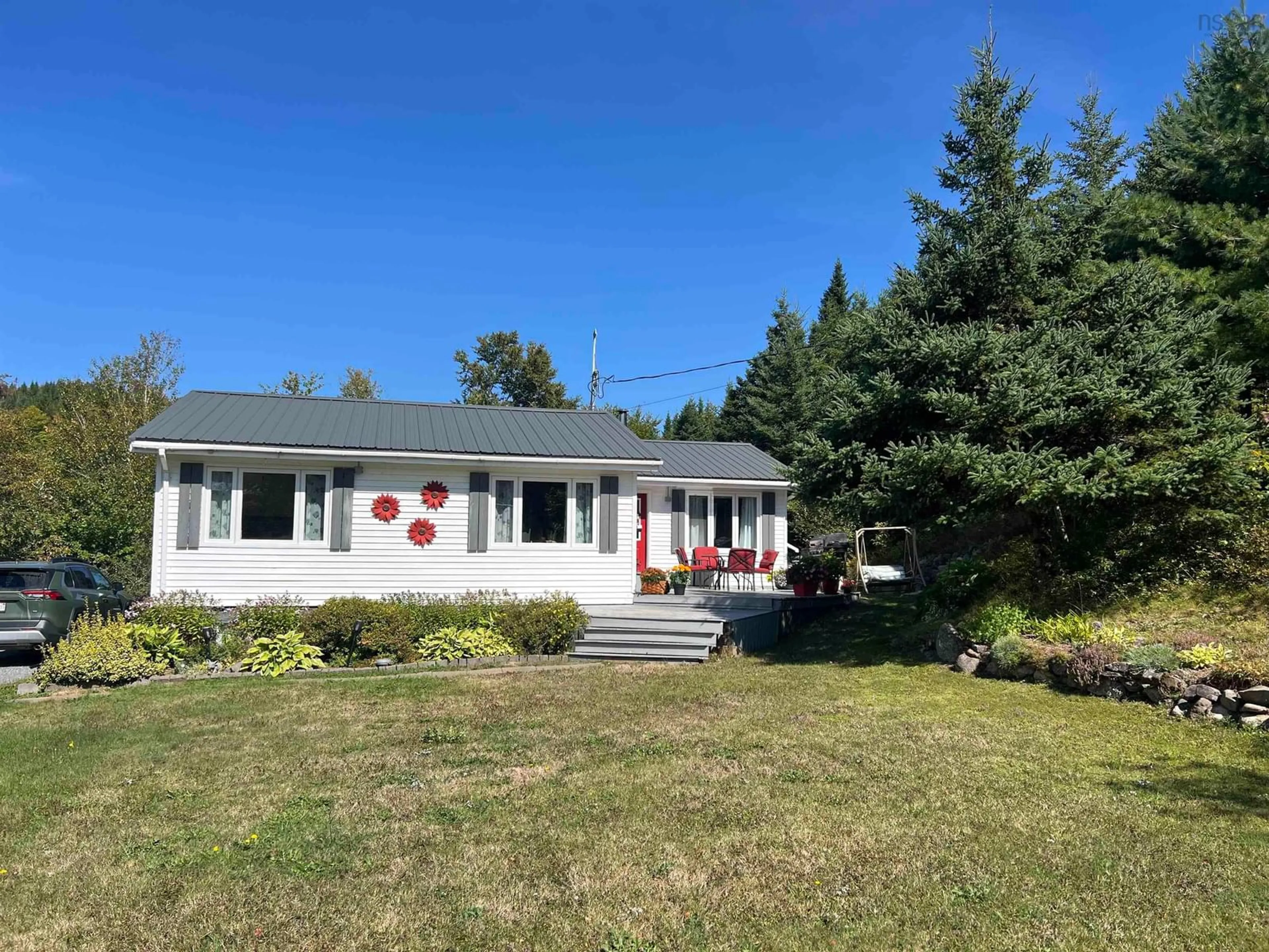 A pic from outside/outdoor area/front of a property/back of a property/a pic from drone, unknown for 31 Mckenzie Settlement Rd, Upper North River Nova Scotia B6L 6L7