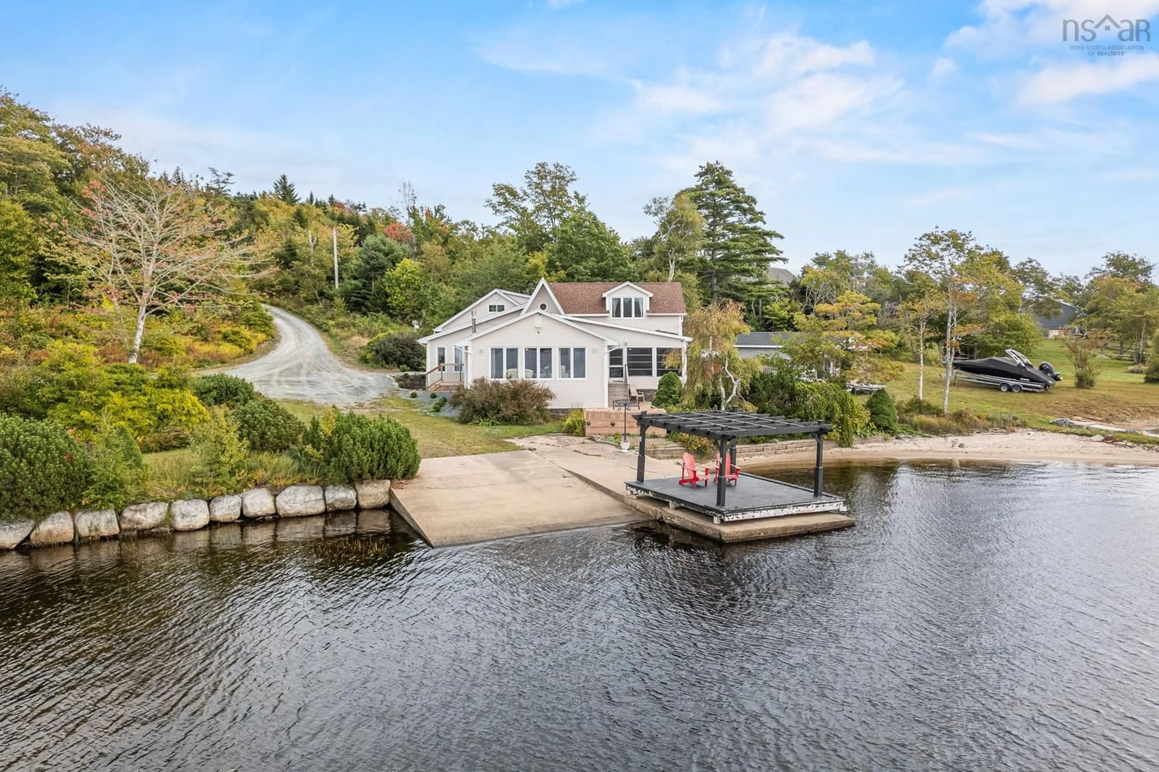 A pic from outside/outdoor area/front of a property/back of a property/a pic from drone, water/lake/river/ocean view for 110 Whisper Ridge, Porters Lake Nova Scotia B3E 1J6