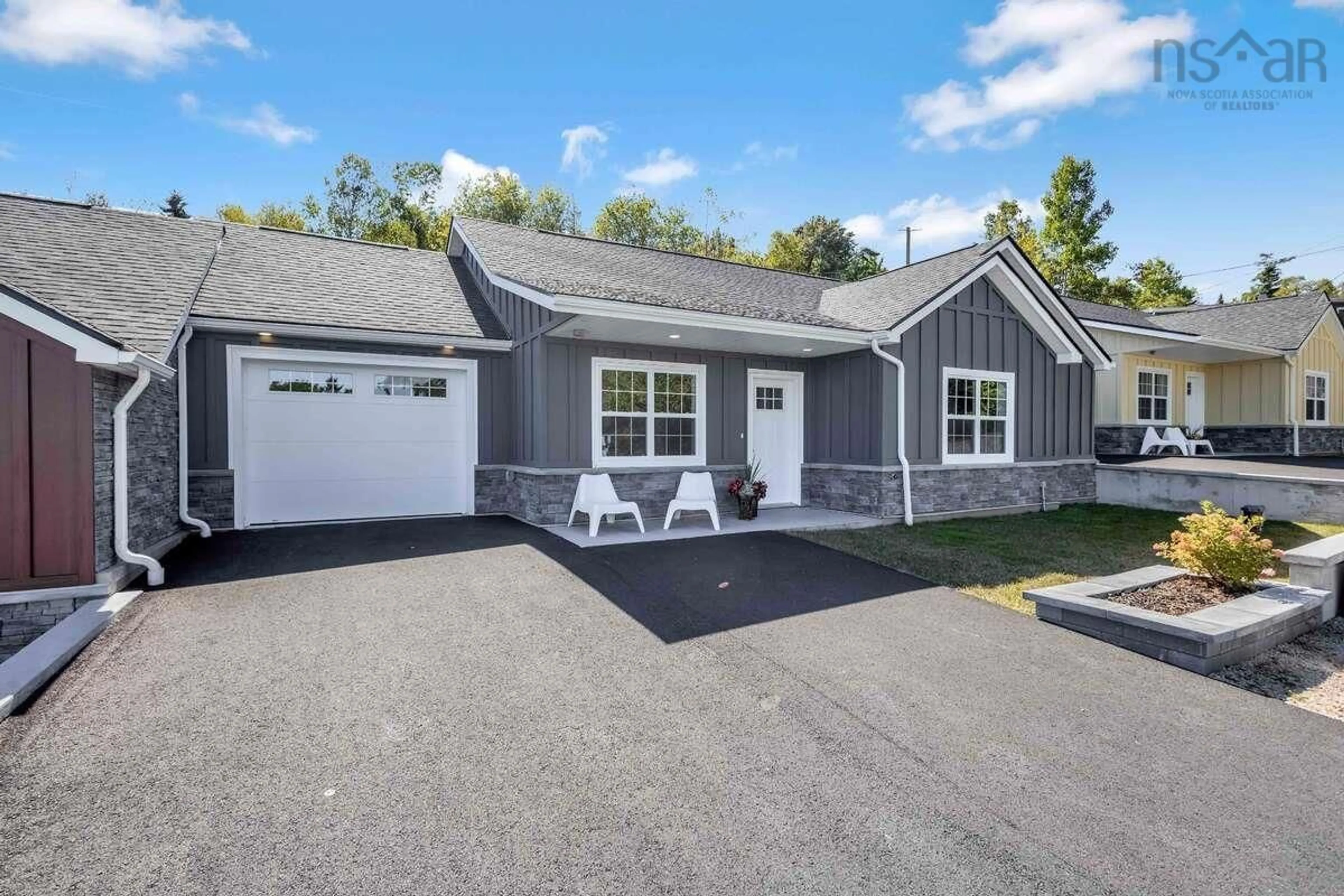 Home with vinyl exterior material, street for 9 Lions Club Rd, Fox Point Nova Scotia B0J 1T0