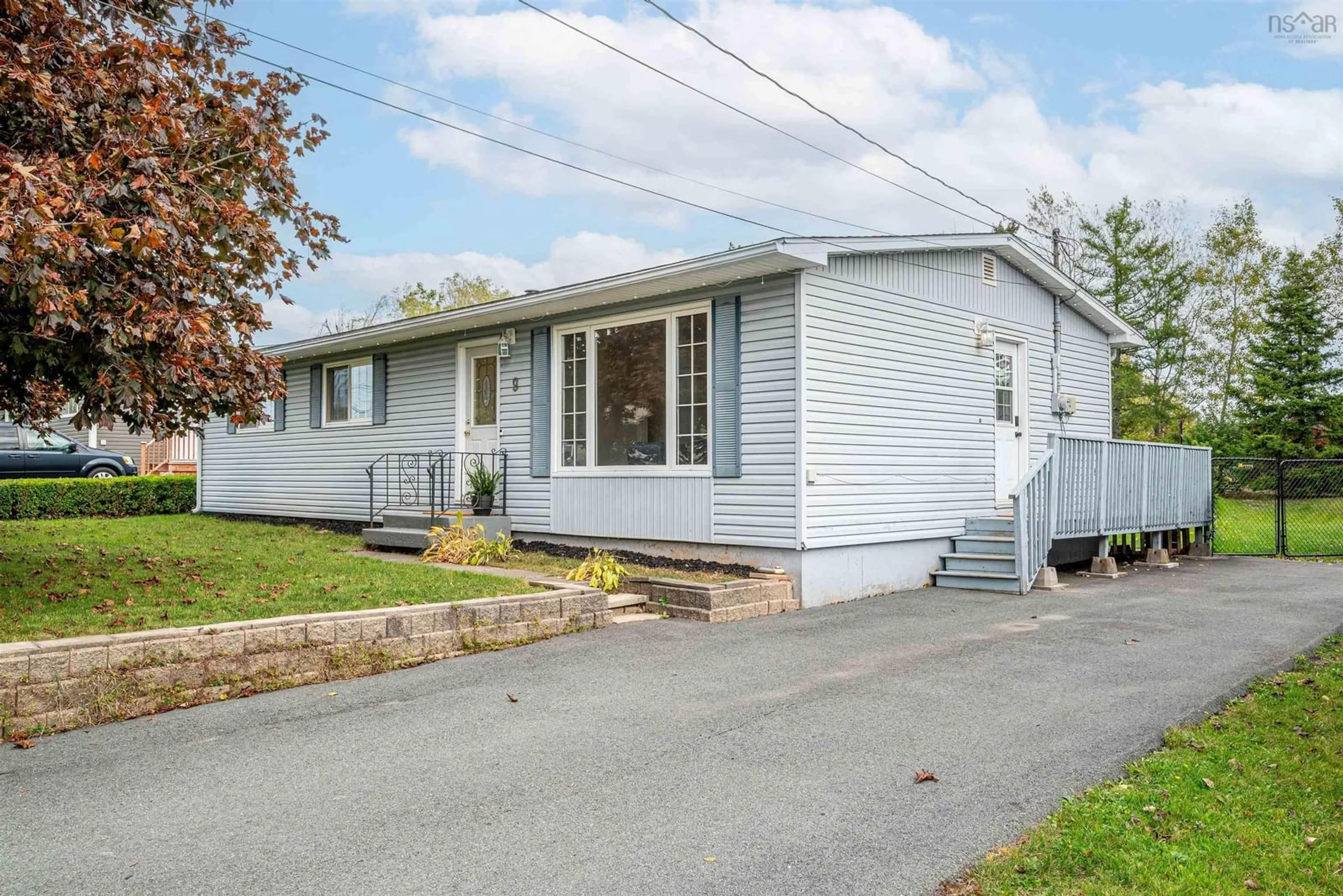 Home with vinyl exterior material, street for 9 Laurie Dr, Lower Sackville Nova Scotia B4E 1G1