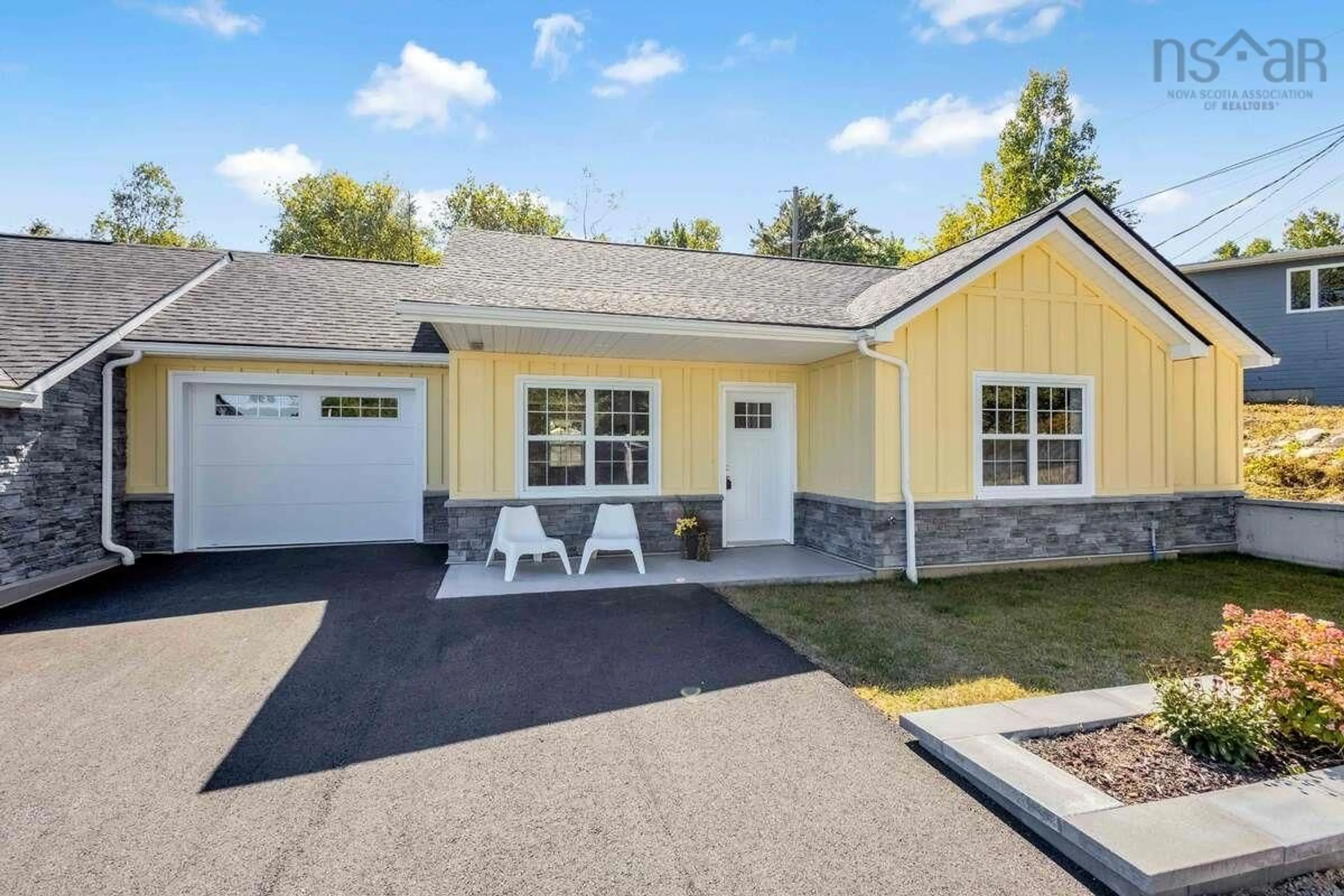 Home with vinyl exterior material, street for 11 Lions Club Rd, Fox Point Nova Scotia B0J 1T0