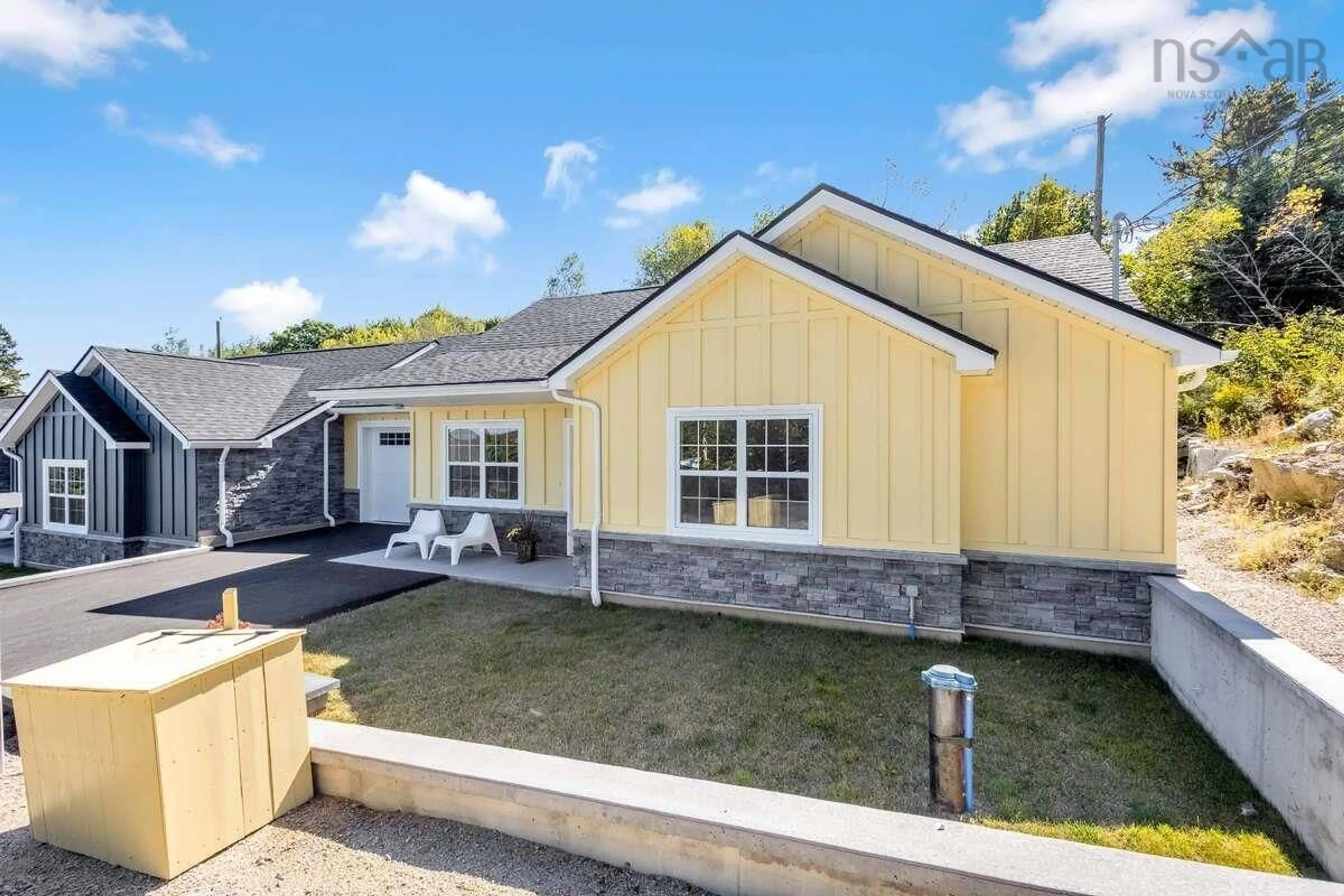 Home with vinyl exterior material, street for 11 Lions Club Rd, Fox Point Nova Scotia B0J 1T0
