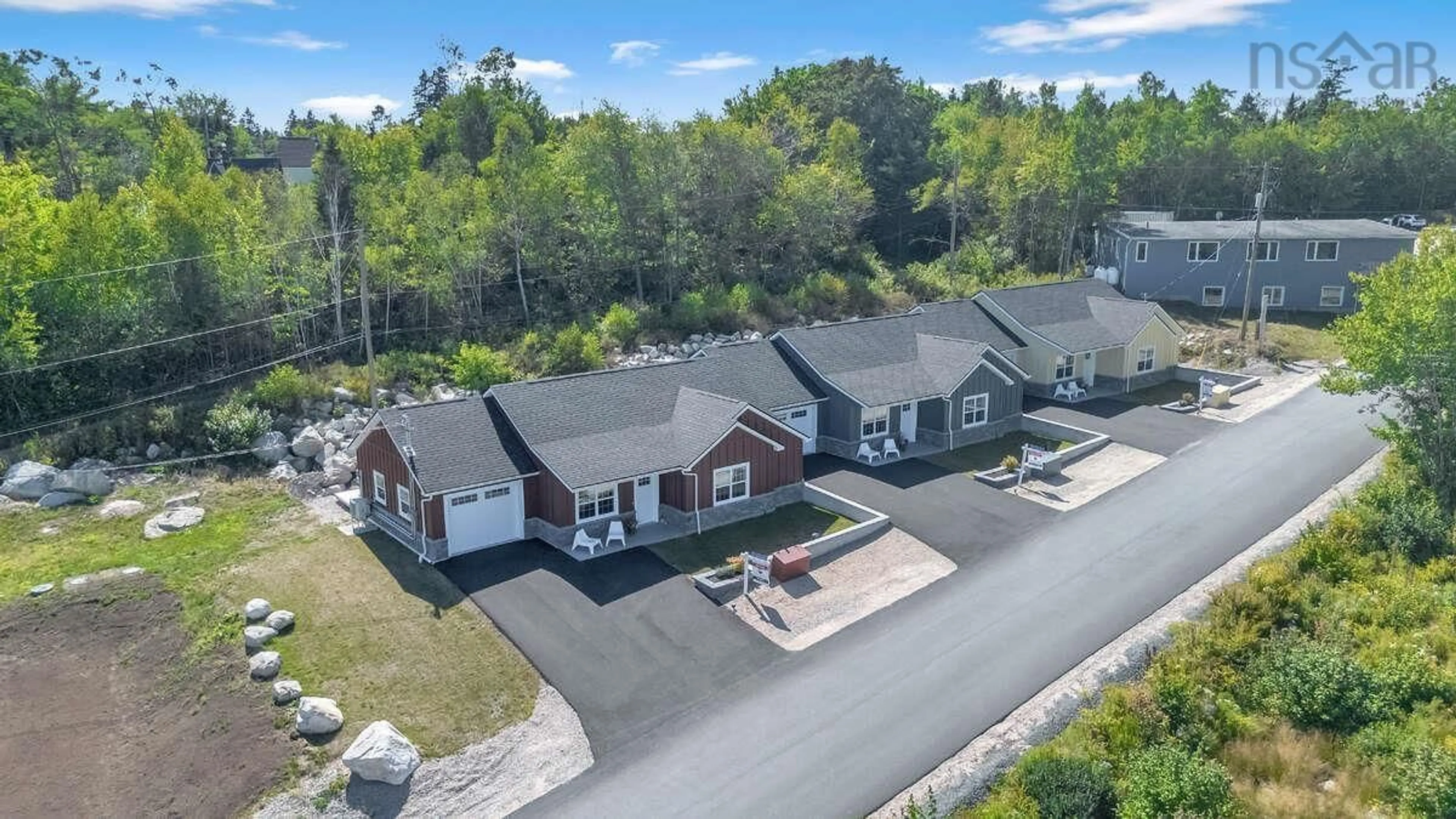 A pic from outside/outdoor area/front of a property/back of a property/a pic from drone, street for 11 Lions Club Rd, Fox Point Nova Scotia B0J 1T0