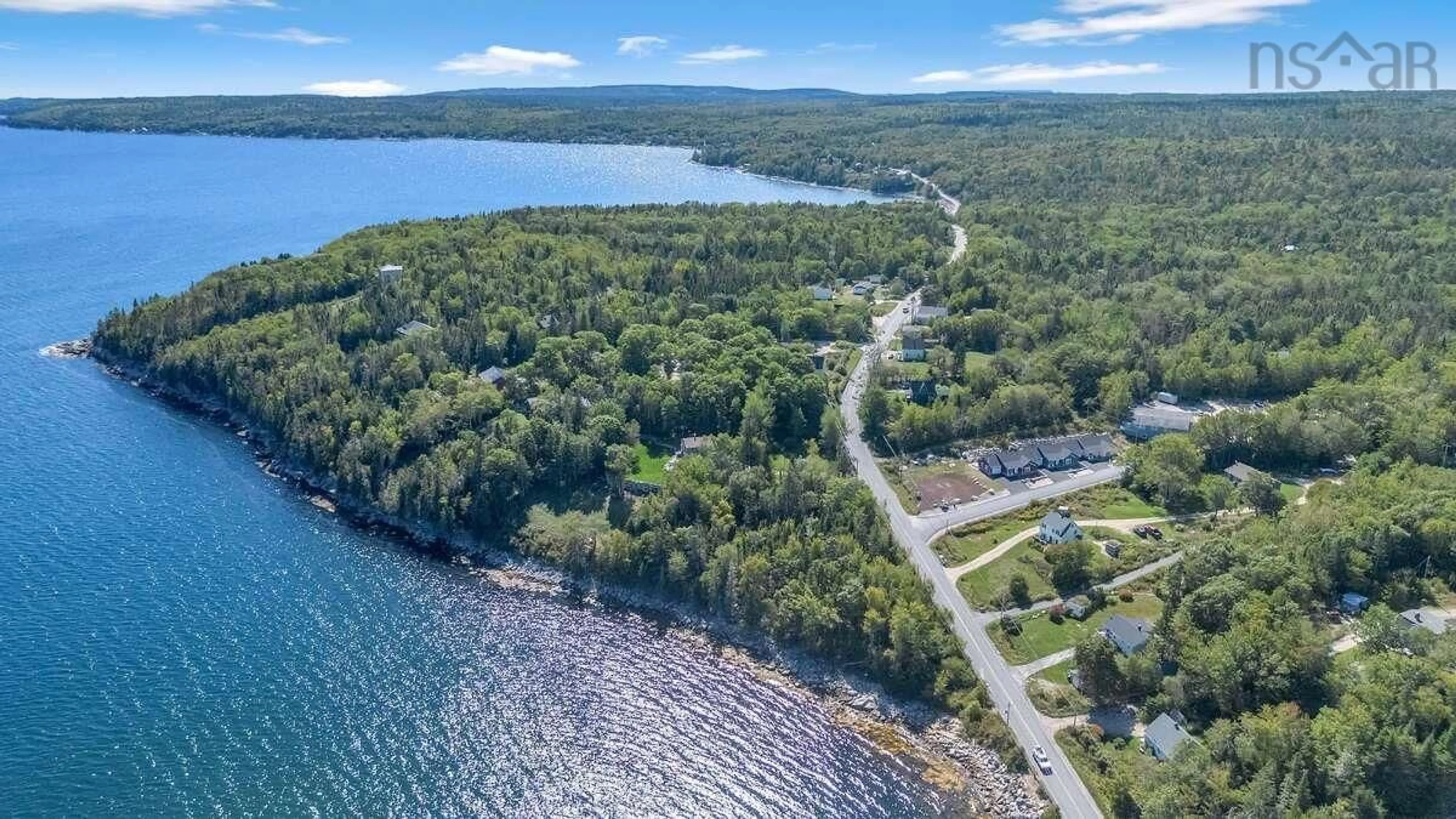 A pic from outside/outdoor area/front of a property/back of a property/a pic from drone, water/lake/river/ocean view for 11 Lions Club Rd, Fox Point Nova Scotia B0J 1T0