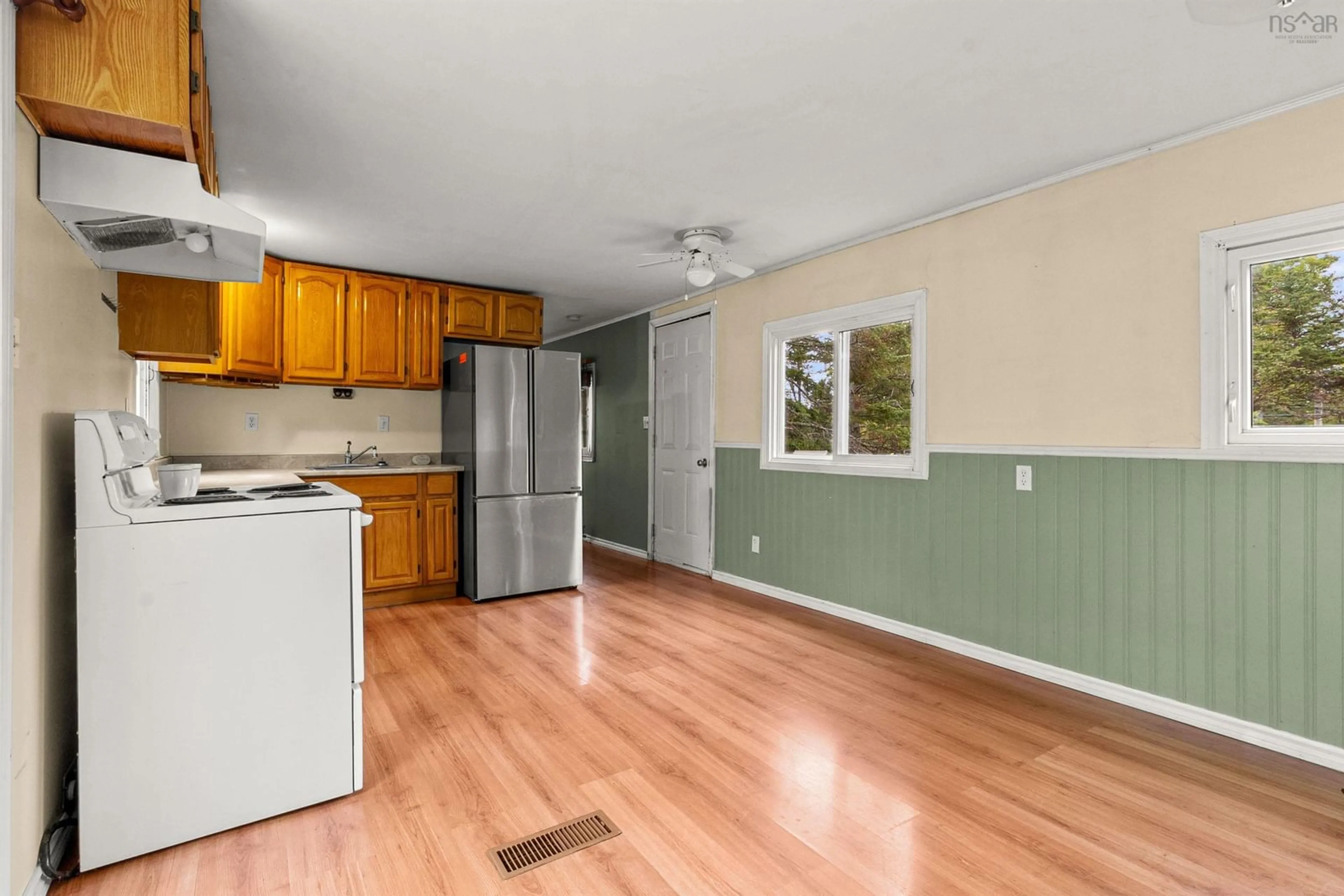 Open concept kitchen, wood/laminate floor for 8252 Highway 1, Ardoise Nova Scotia B0N 1L0