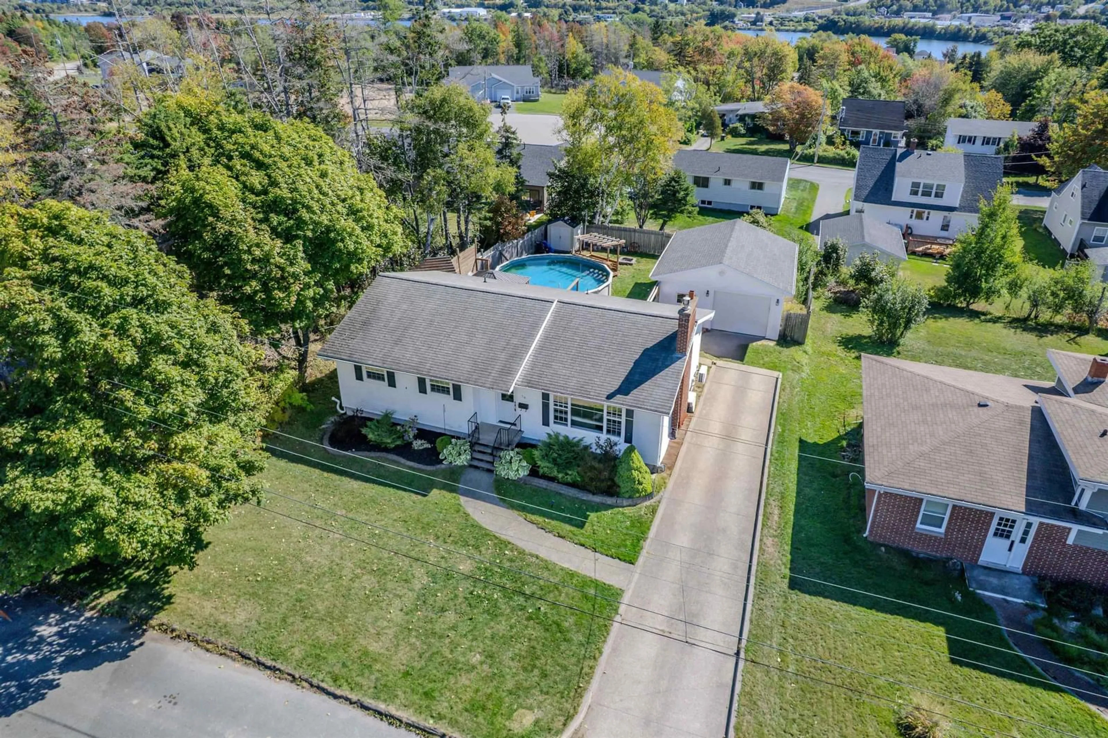 A pic from outside/outdoor area/front of a property/back of a property/a pic from drone, water/lake/river/ocean view for 56 Kelmere Dr, Sydney Nova Scotia B1R 1P8