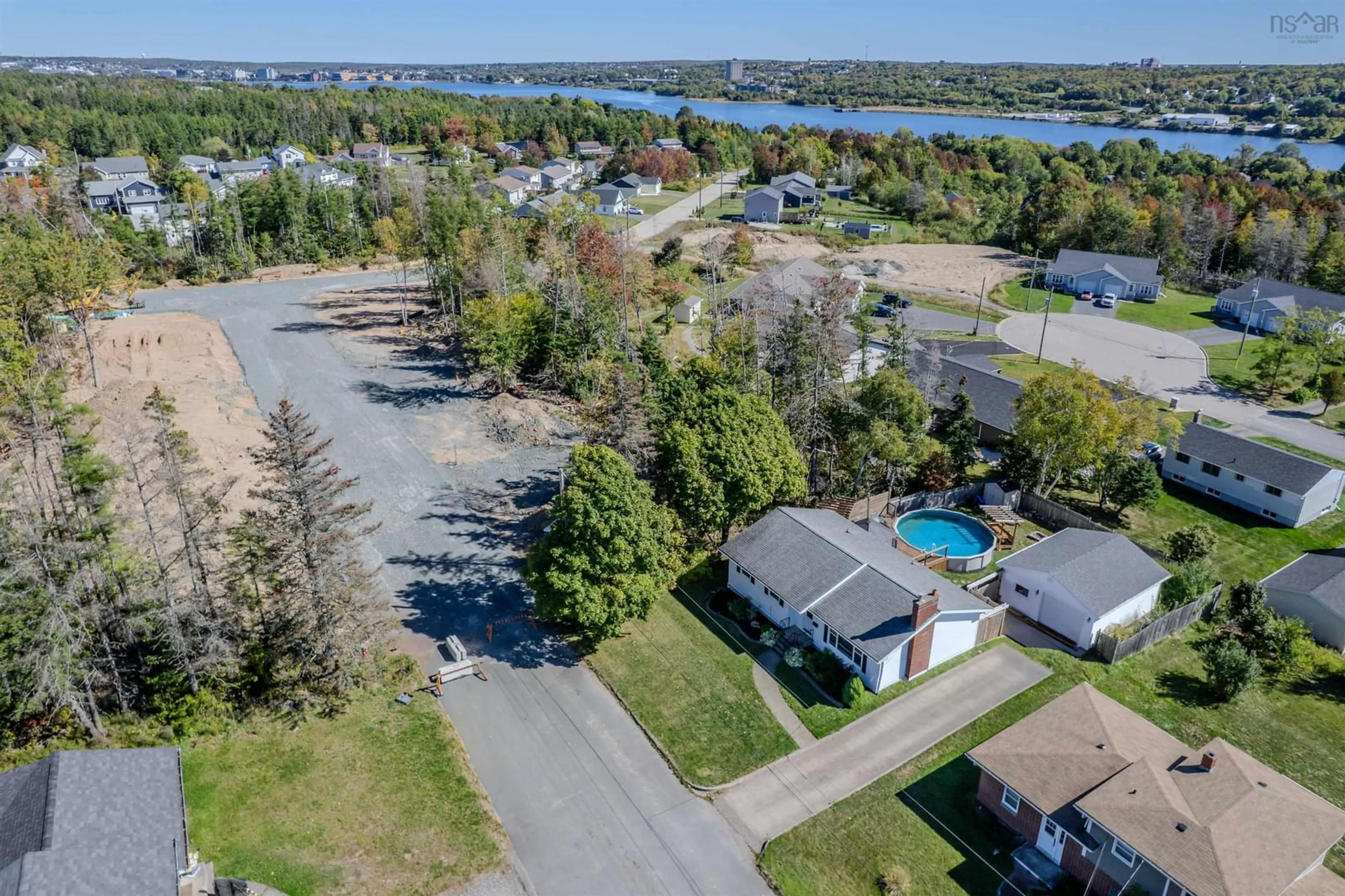 A pic from outside/outdoor area/front of a property/back of a property/a pic from drone, water/lake/river/ocean view for 56 Kelmere Dr, Sydney Nova Scotia B1R 1P8