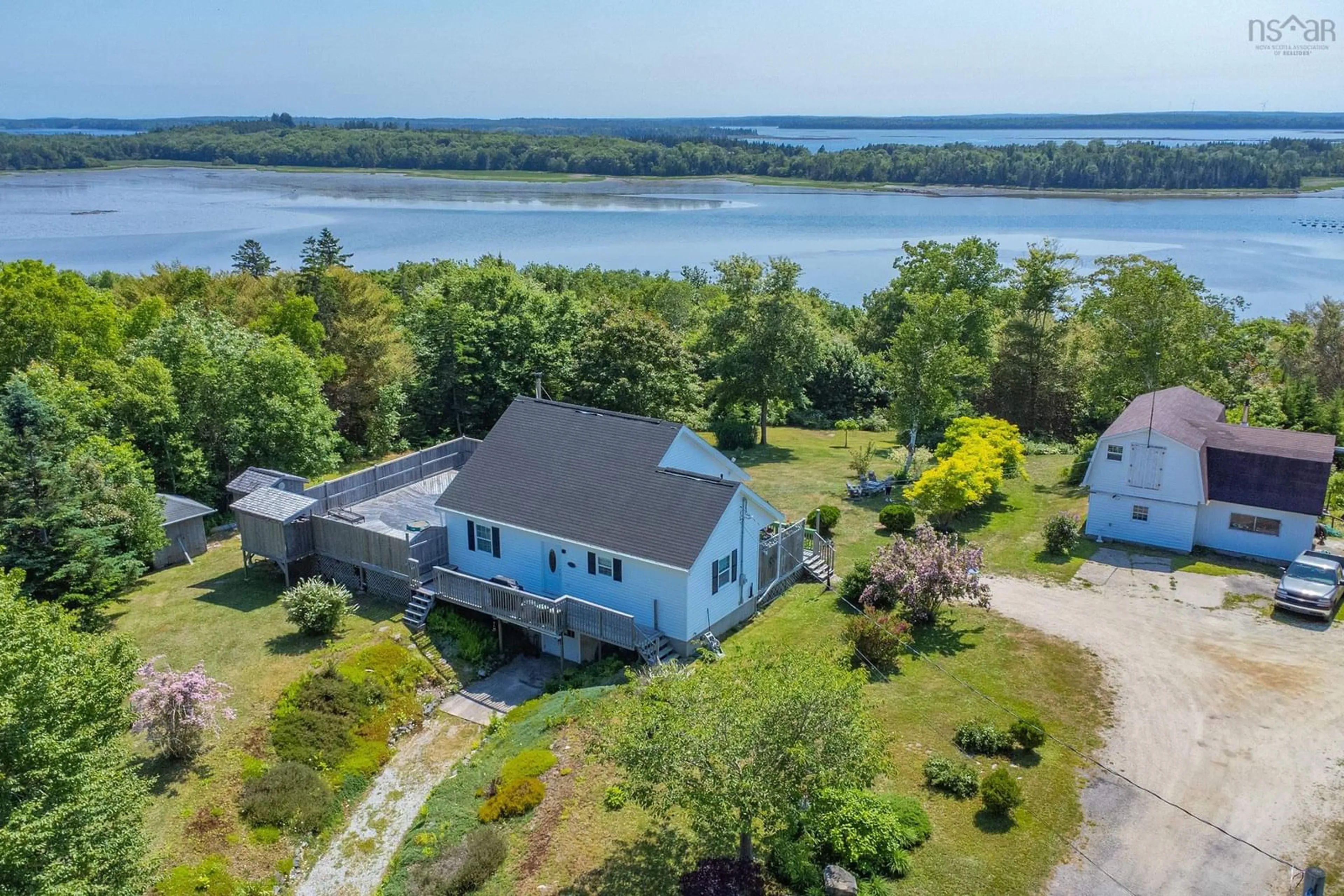A pic from outside/outdoor area/front of a property/back of a property/a pic from drone, water/lake/river/ocean view for 6451 Highway 3, Eel Brook Nova Scotia B0W 2X0