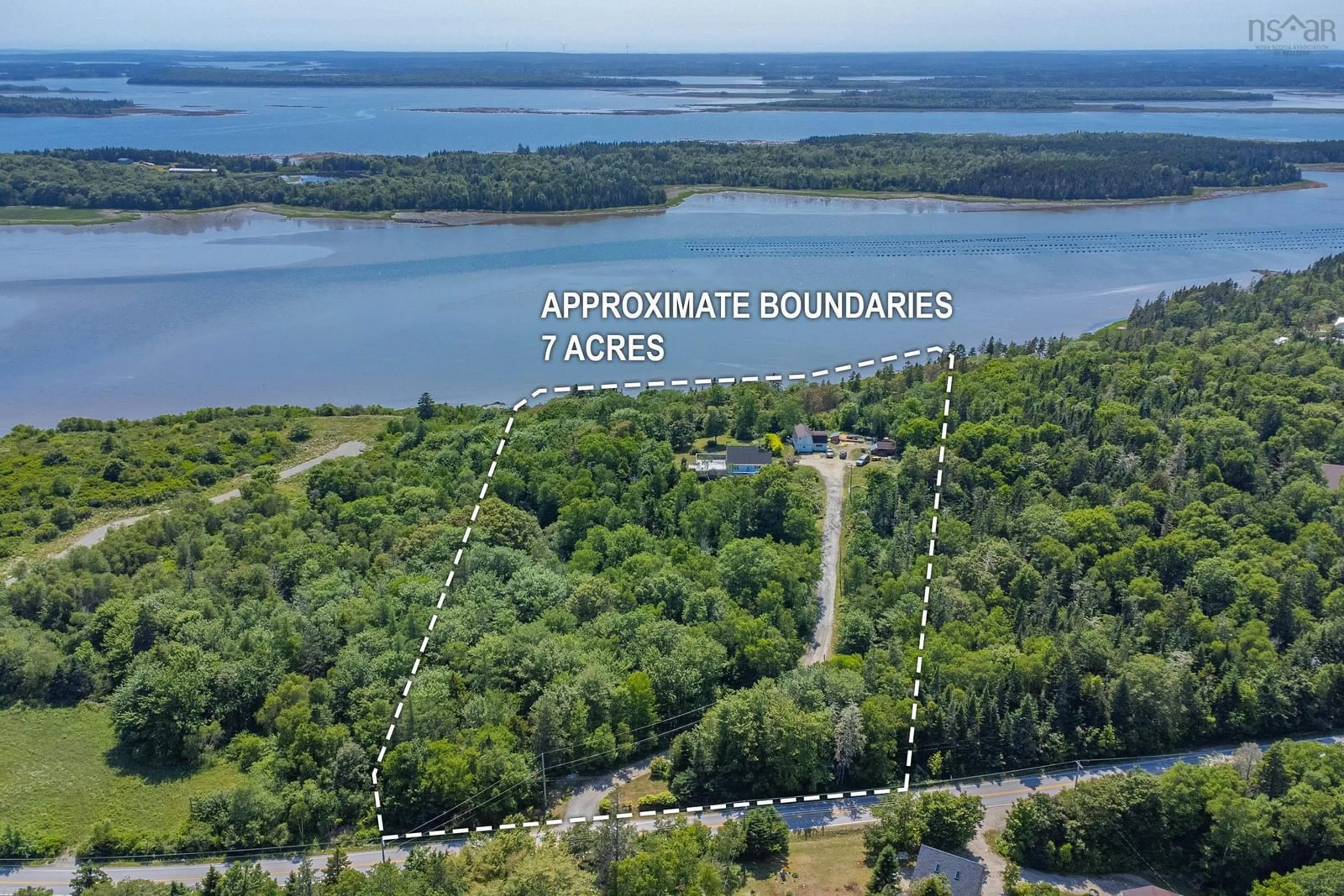 A pic from outside/outdoor area/front of a property/back of a property/a pic from drone, water/lake/river/ocean view for 6451 Highway 3, Eel Brook Nova Scotia B0W 2X0