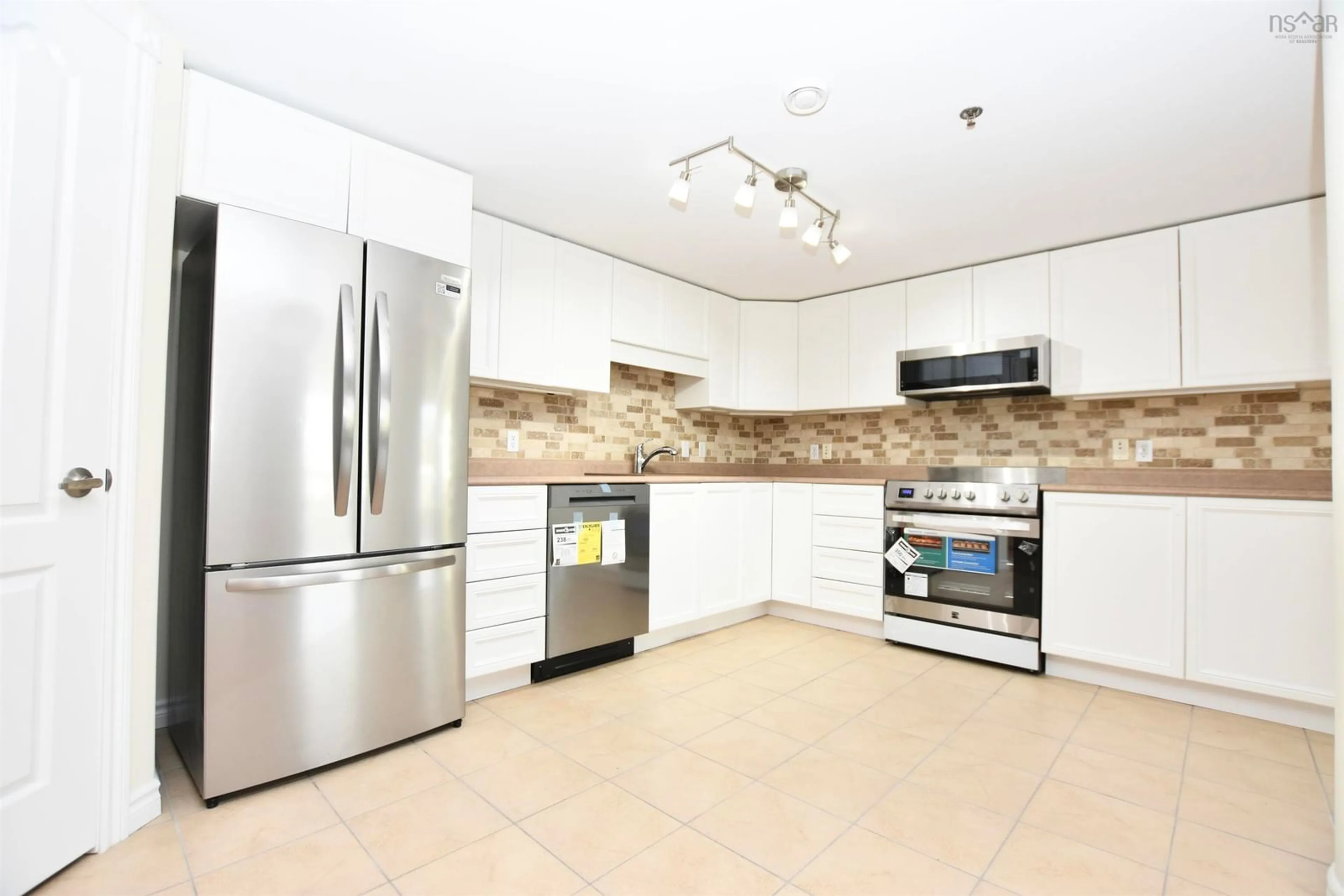 Contemporary kitchen, ceramic/tile floor for 40 Regency Park Dr #105, Halifax Nova Scotia B3S 1L4