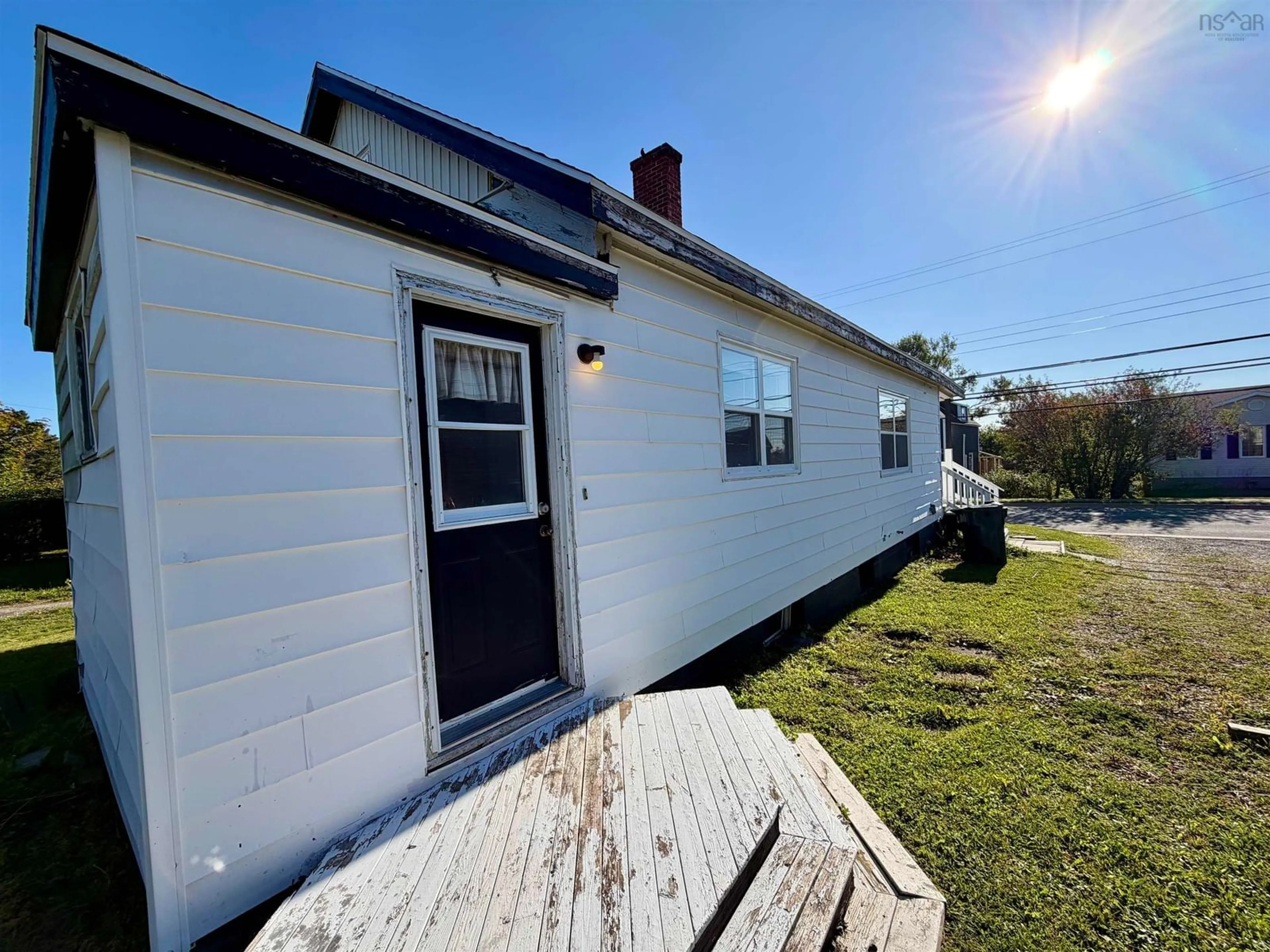A pic from outside/outdoor area/front of a property/back of a property/a pic from drone, building for 18 Highland St, Glace Bay Nova Scotia B1A 2T5