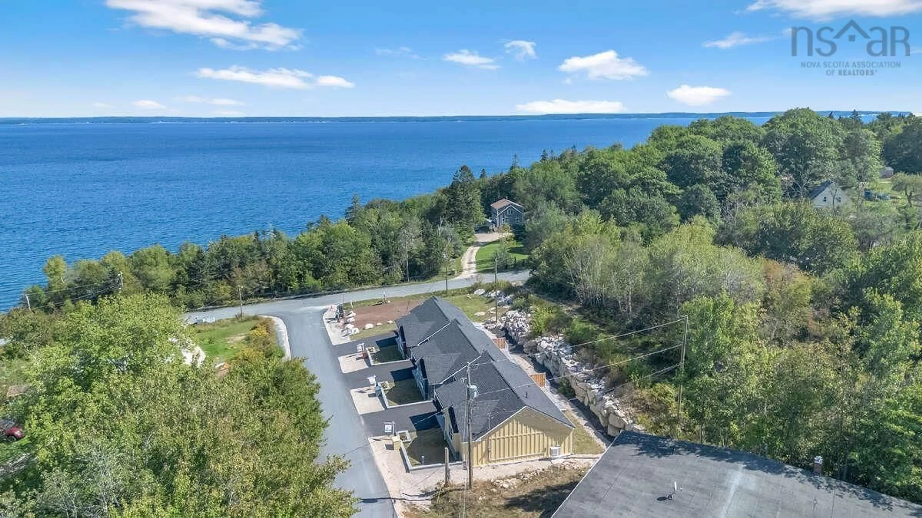 A pic from outside/outdoor area/front of a property/back of a property/a pic from drone, water/lake/river/ocean view for 7 Lions Club Rd, Fox Point Nova Scotia B0J 1T0