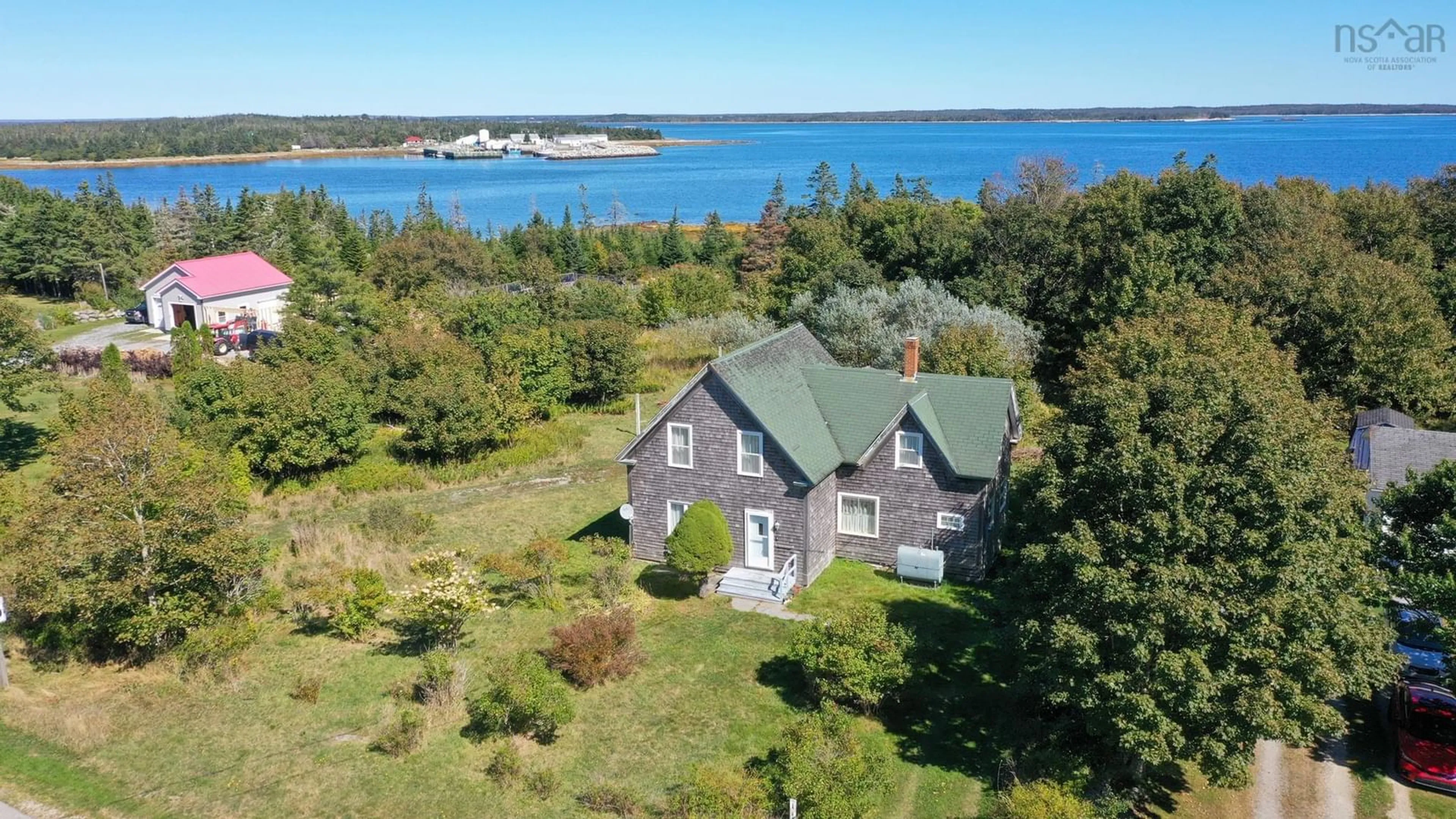 A pic from outside/outdoor area/front of a property/back of a property/a pic from drone, water/lake/river/ocean view for 141 Old Ferry Rd Port Latour, Port La Tour Nova Scotia B0W 2T0
