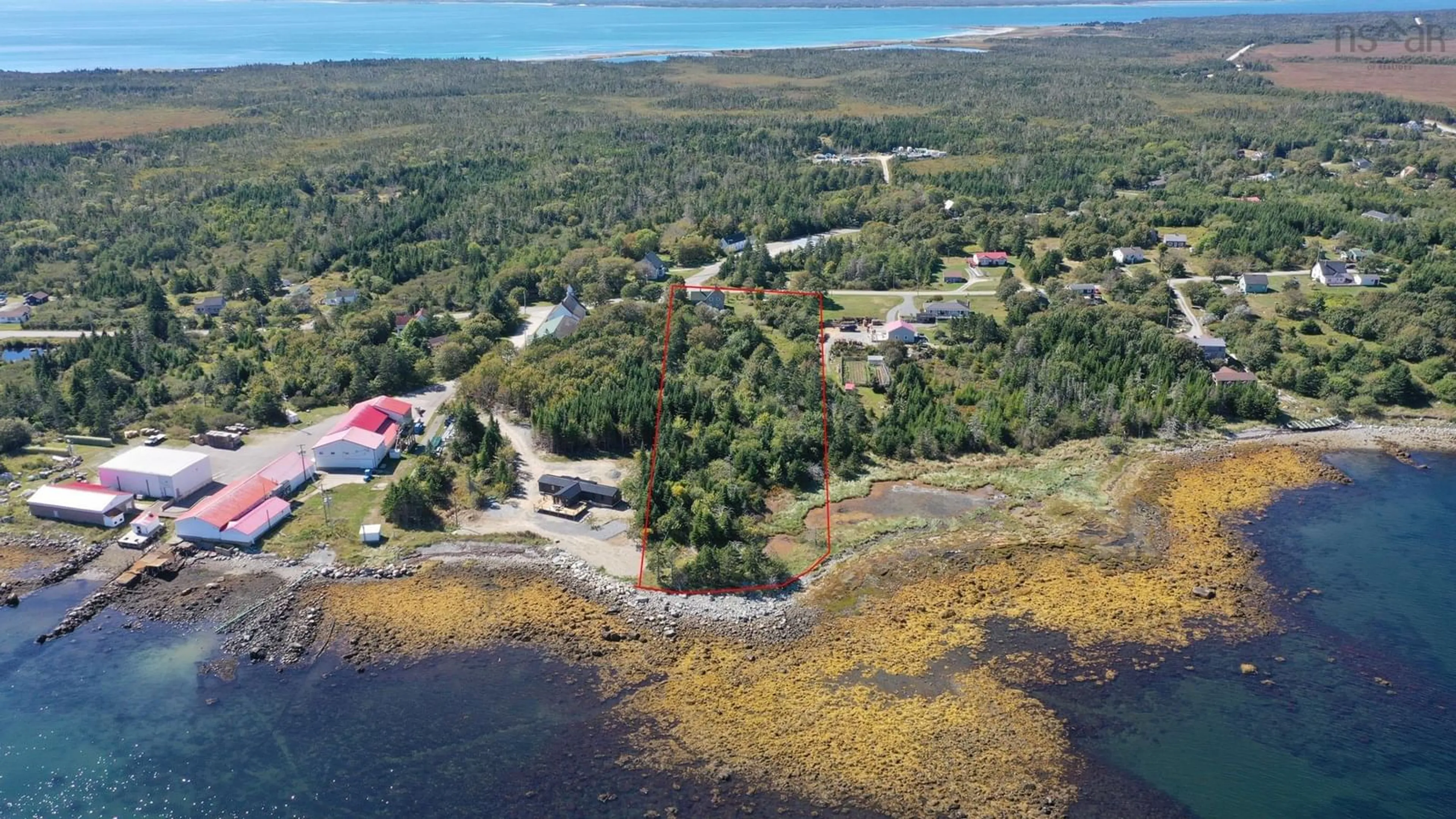 A pic from outside/outdoor area/front of a property/back of a property/a pic from drone, water/lake/river/ocean view for 141 Old Ferry Rd Port Latour, Port La Tour Nova Scotia B0W 2T0