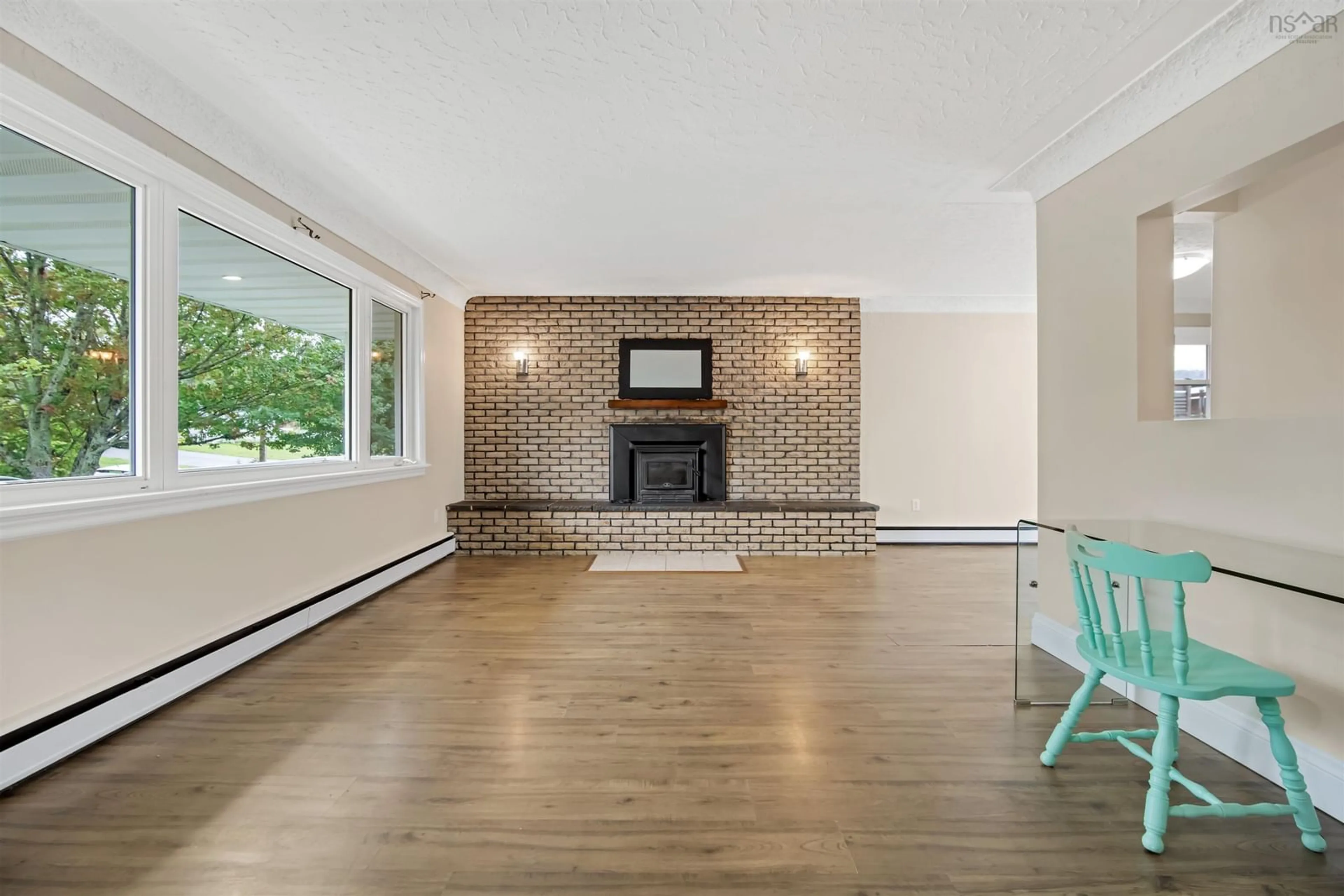 Living room with furniture, wood/laminate floor for 7 Karen Dr, Westphal Nova Scotia B2W 3T1