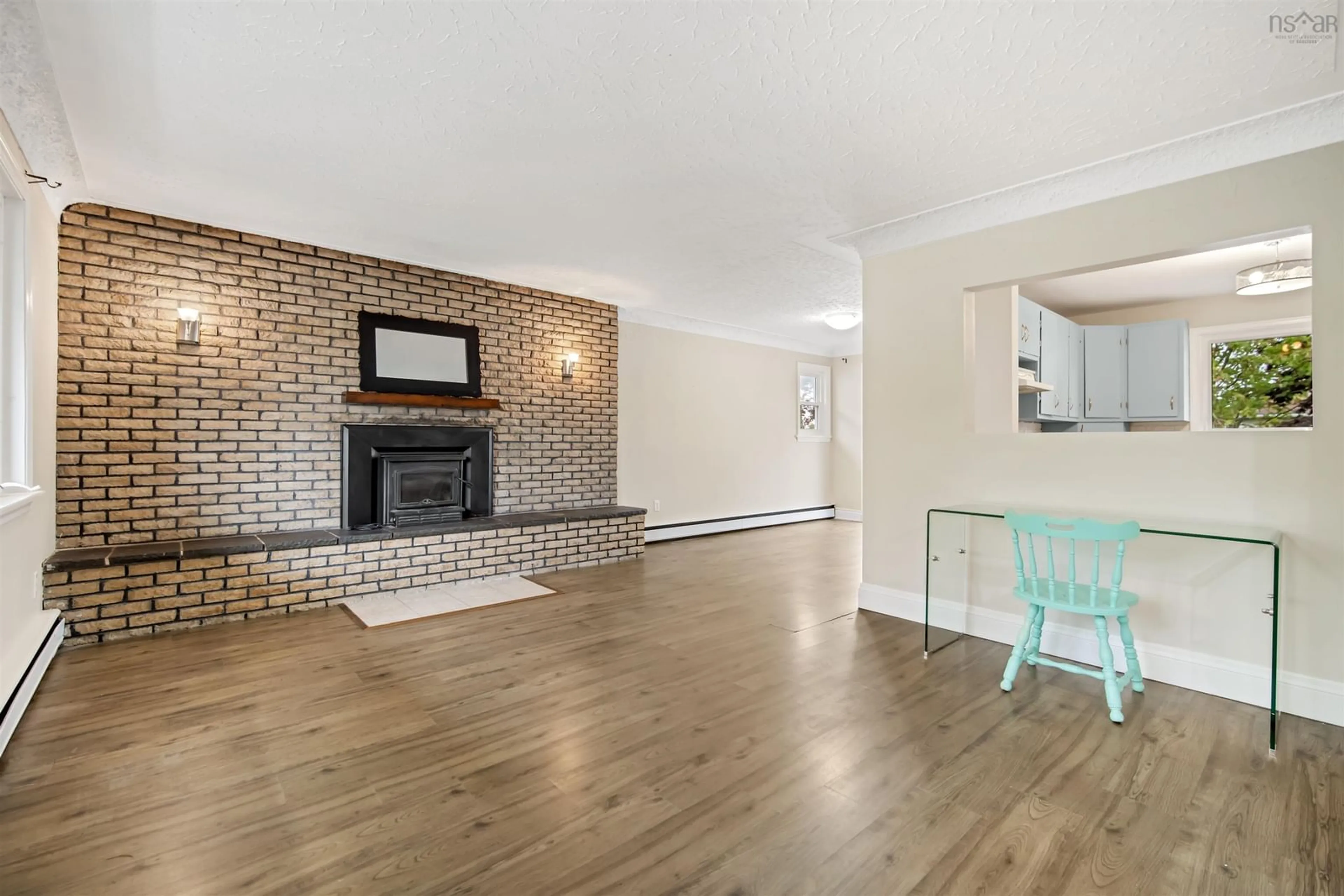 Living room with furniture, wood/laminate floor for 7 Karen Dr, Westphal Nova Scotia B2W 3T1