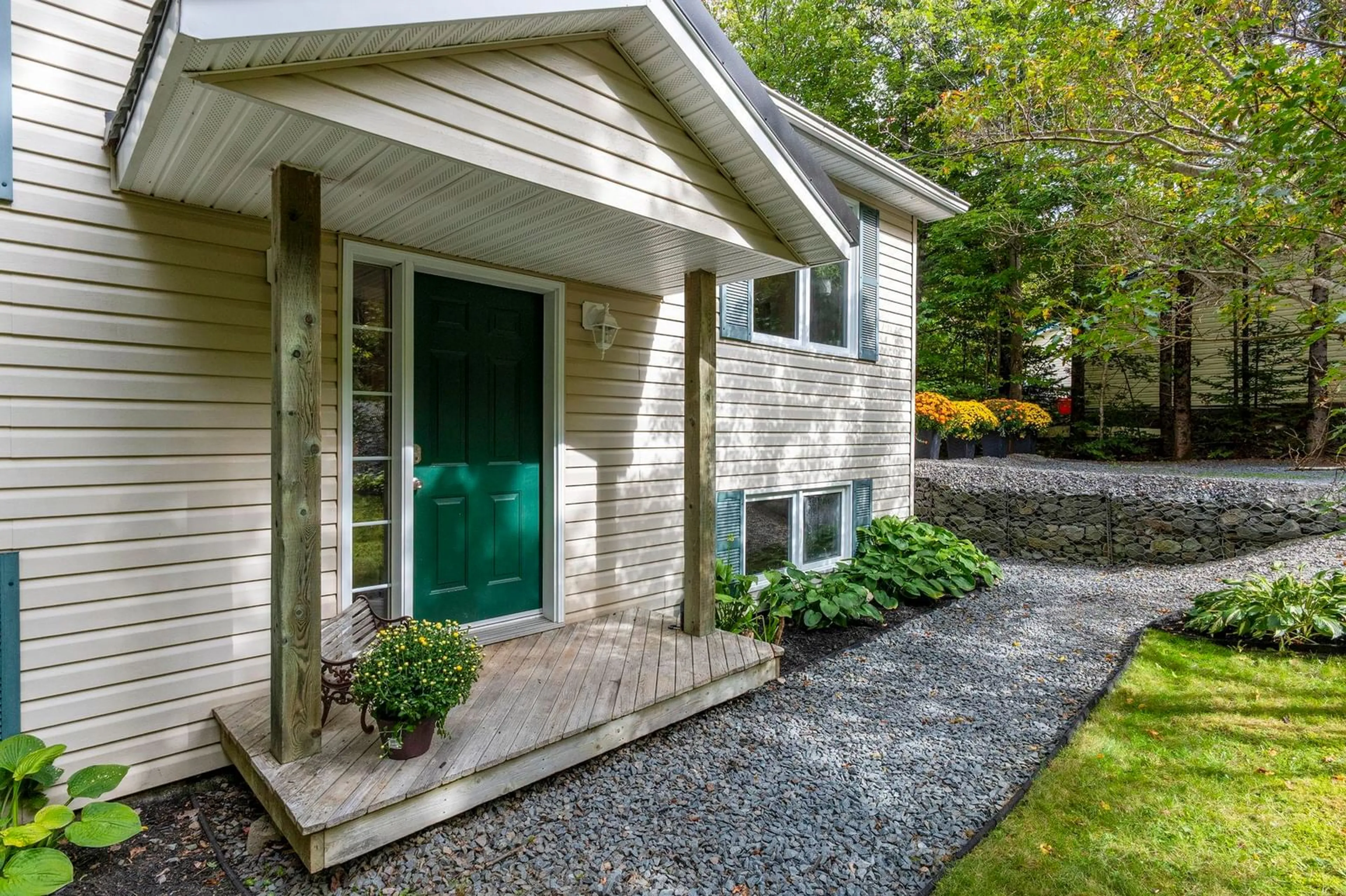 Home with vinyl exterior material, street for 1309 Myra Rd, Porters Lake Nova Scotia B3E 1G9