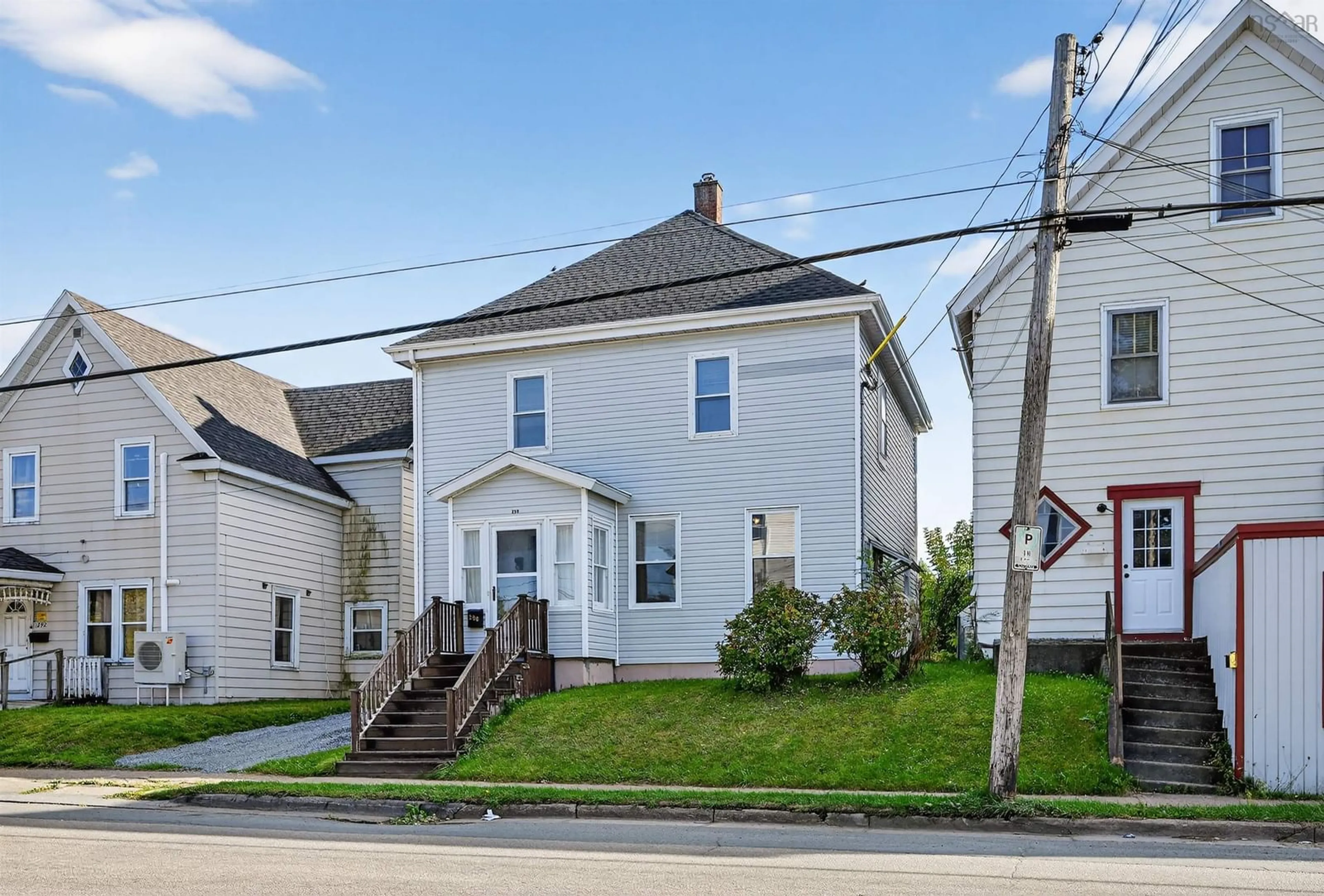 A pic from outside/outdoor area/front of a property/back of a property/a pic from drone, street for 290 Townsend Street, Sydney Nova Scotia B1P 5E9