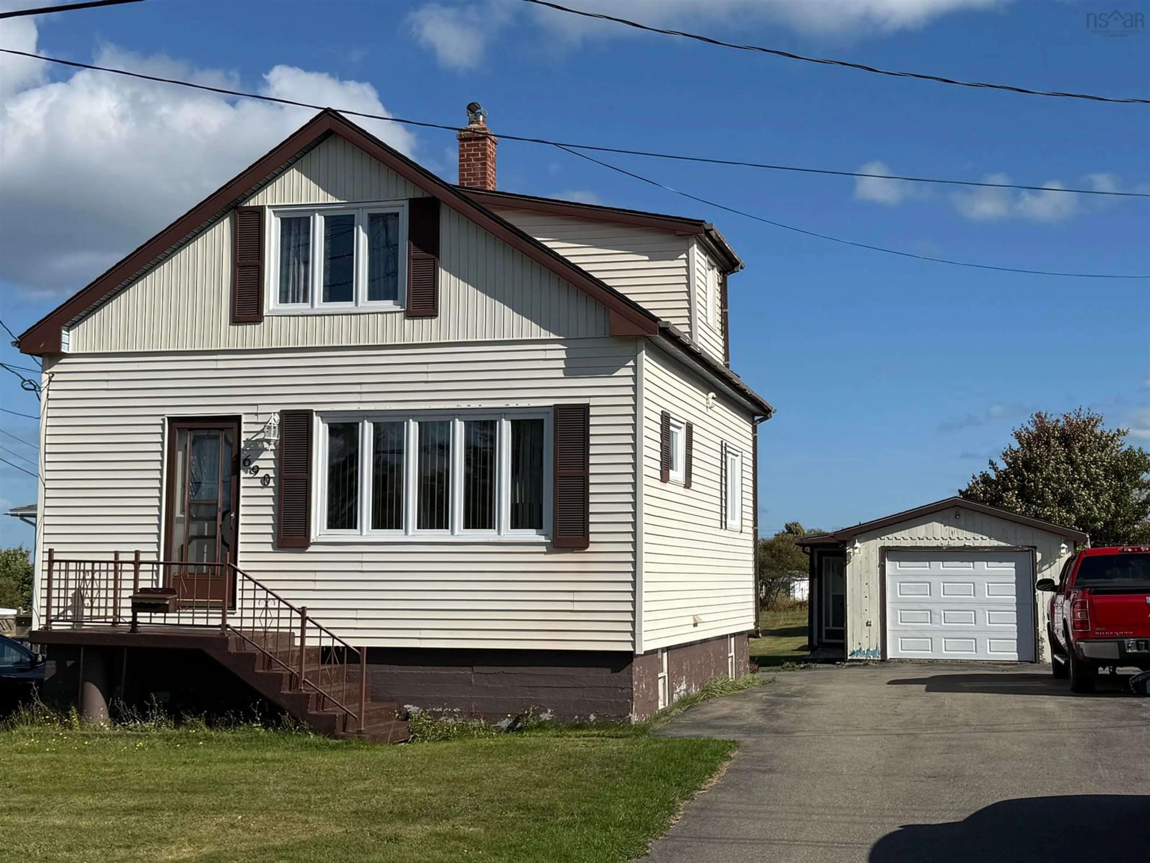 Home with vinyl exterior material, street for 690 St. Joseph St, New Waterford Nova Scotia B1H 4G6