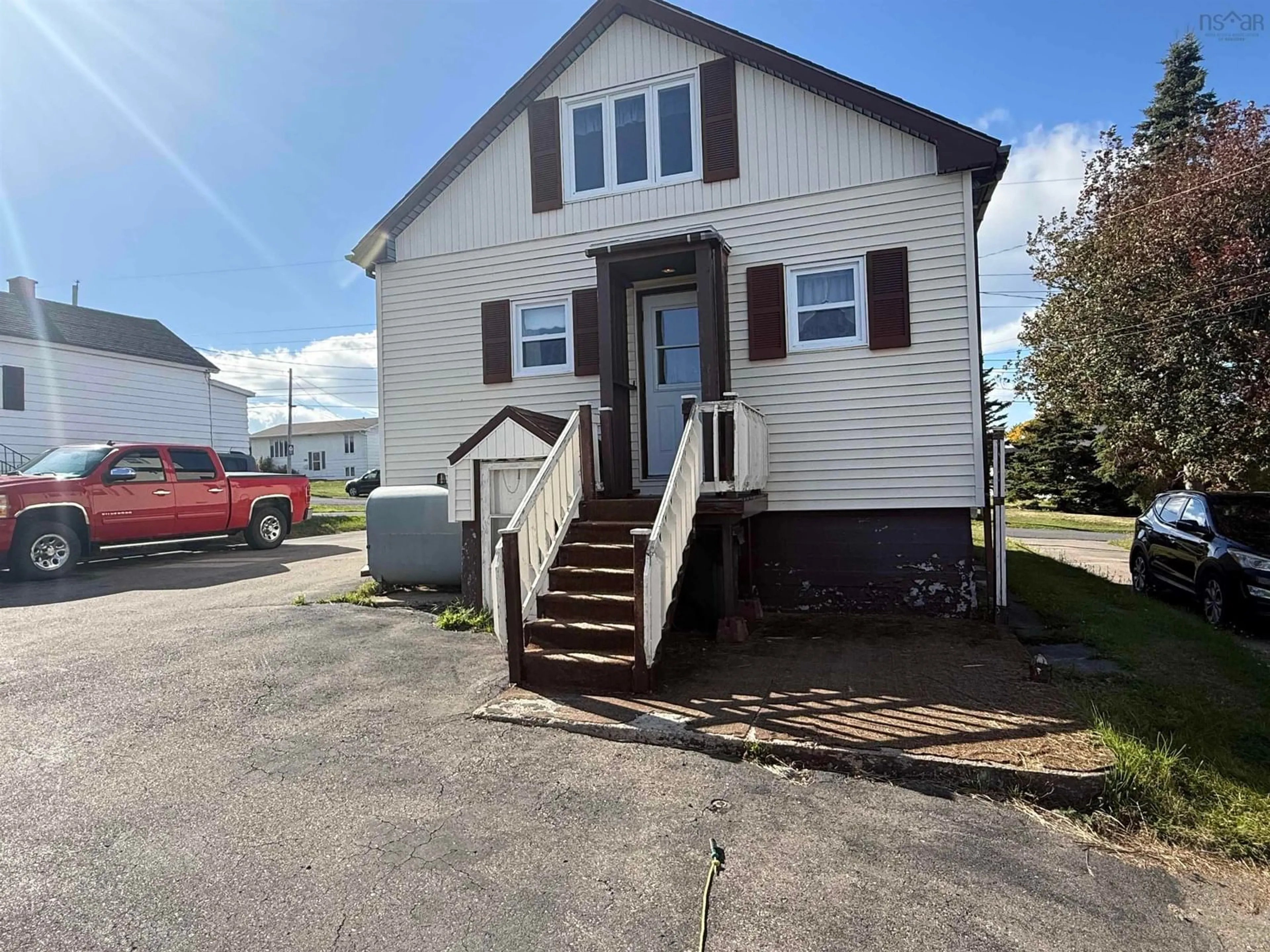 A pic from outside/outdoor area/front of a property/back of a property/a pic from drone, street for 690 St. Joseph St, New Waterford Nova Scotia B1H 4G6