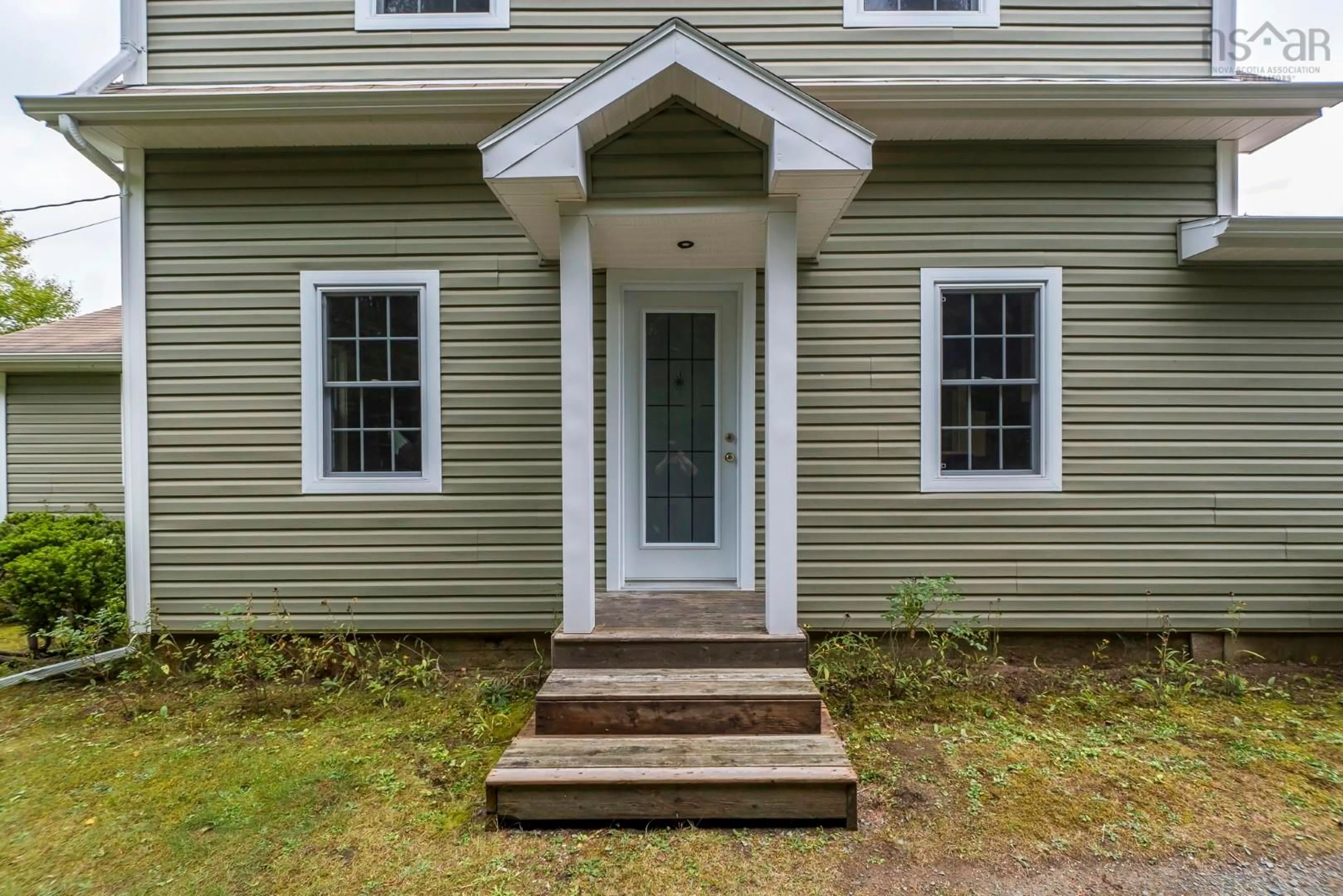 Home with vinyl exterior material, street for 473 East Petpeswick Rd, East Petpeswick Nova Scotia B0J 2L0