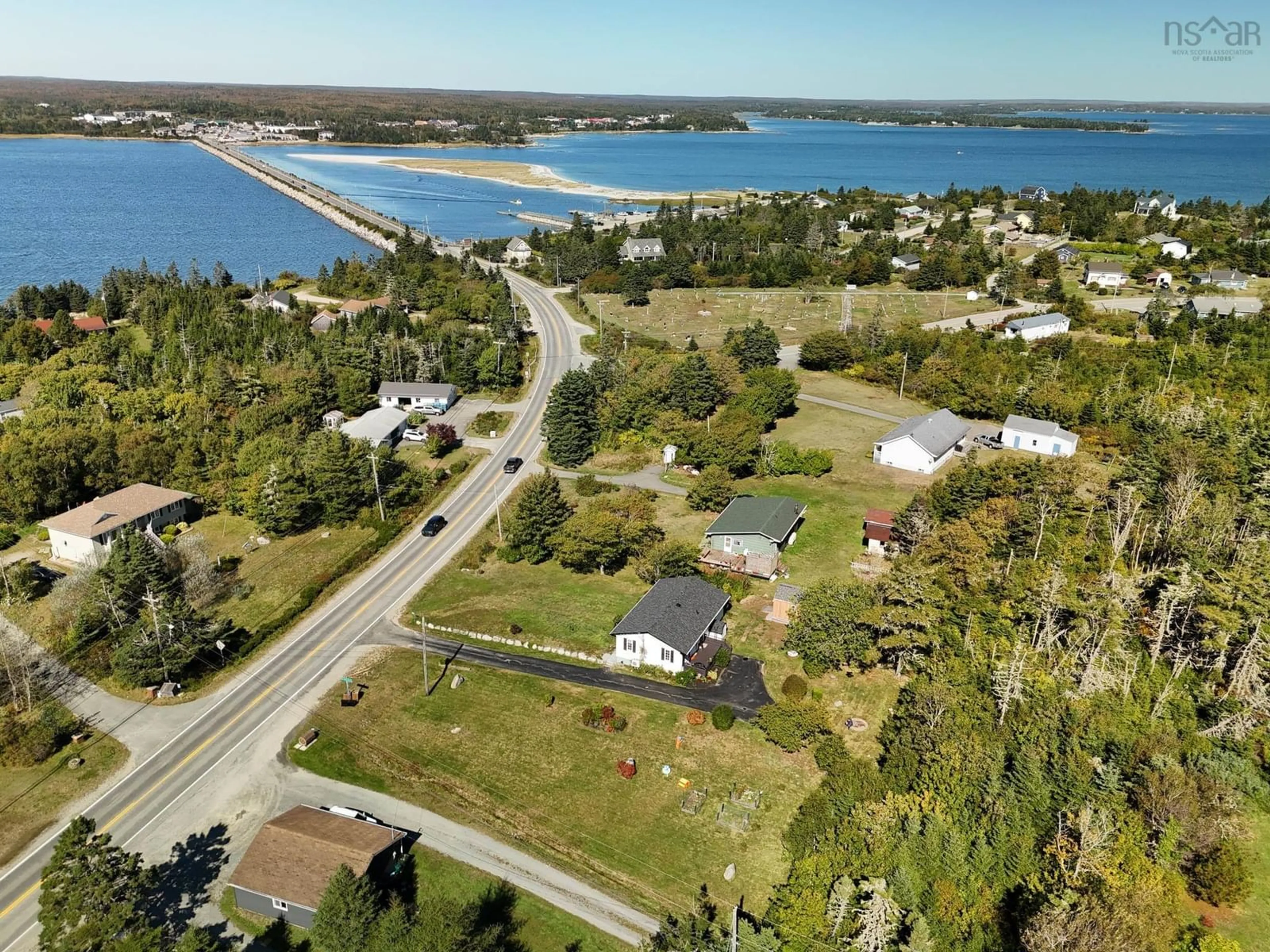 A pic from outside/outdoor area/front of a property/back of a property/a pic from drone, water/lake/river/ocean view for 309 Highway 330, North East Point Nova Scotia B0W 3P0