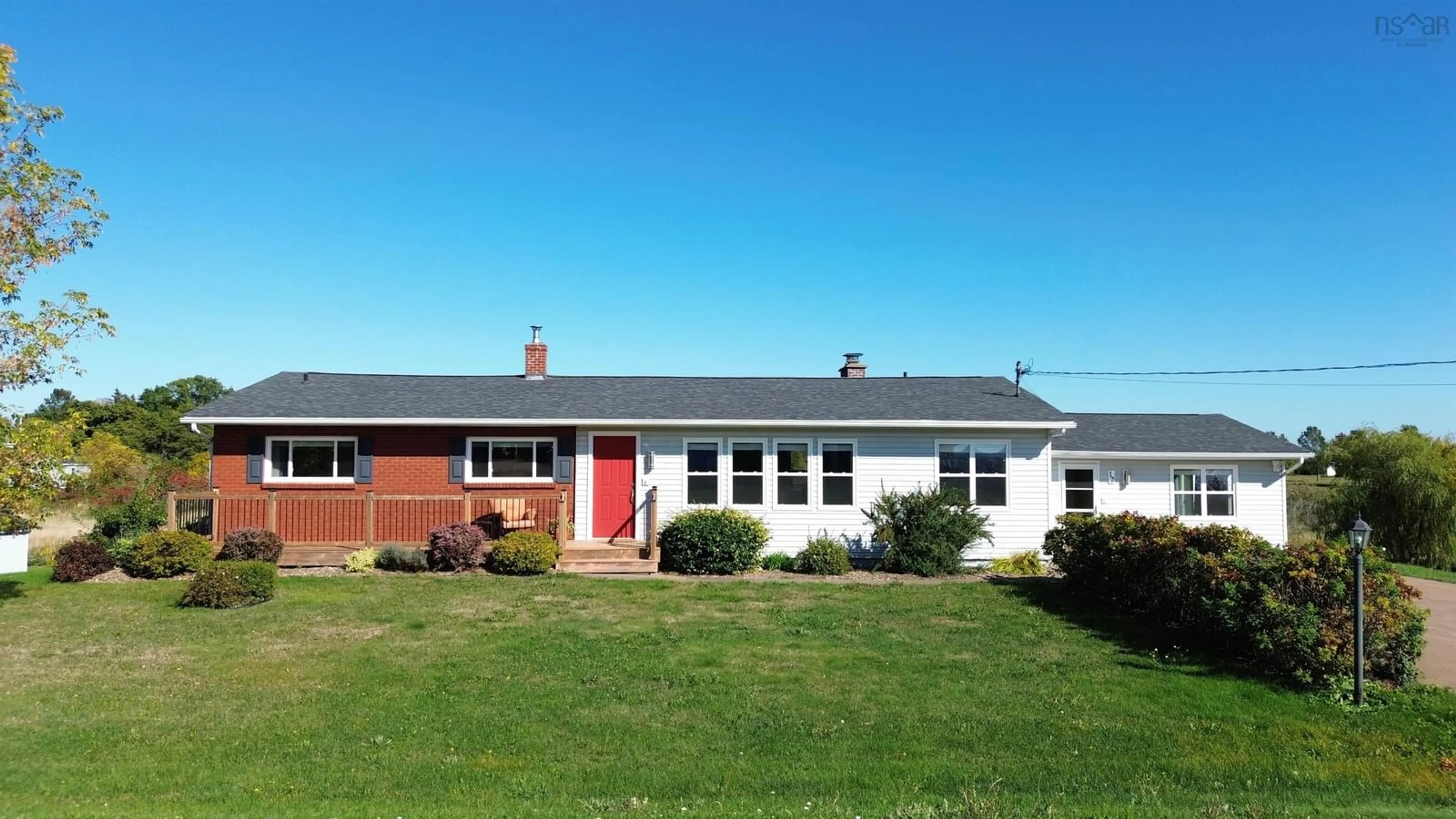 Home with vinyl exterior material, street for 12 Lake Shore Dr, Lyons Brook Nova Scotia B0K 1H0