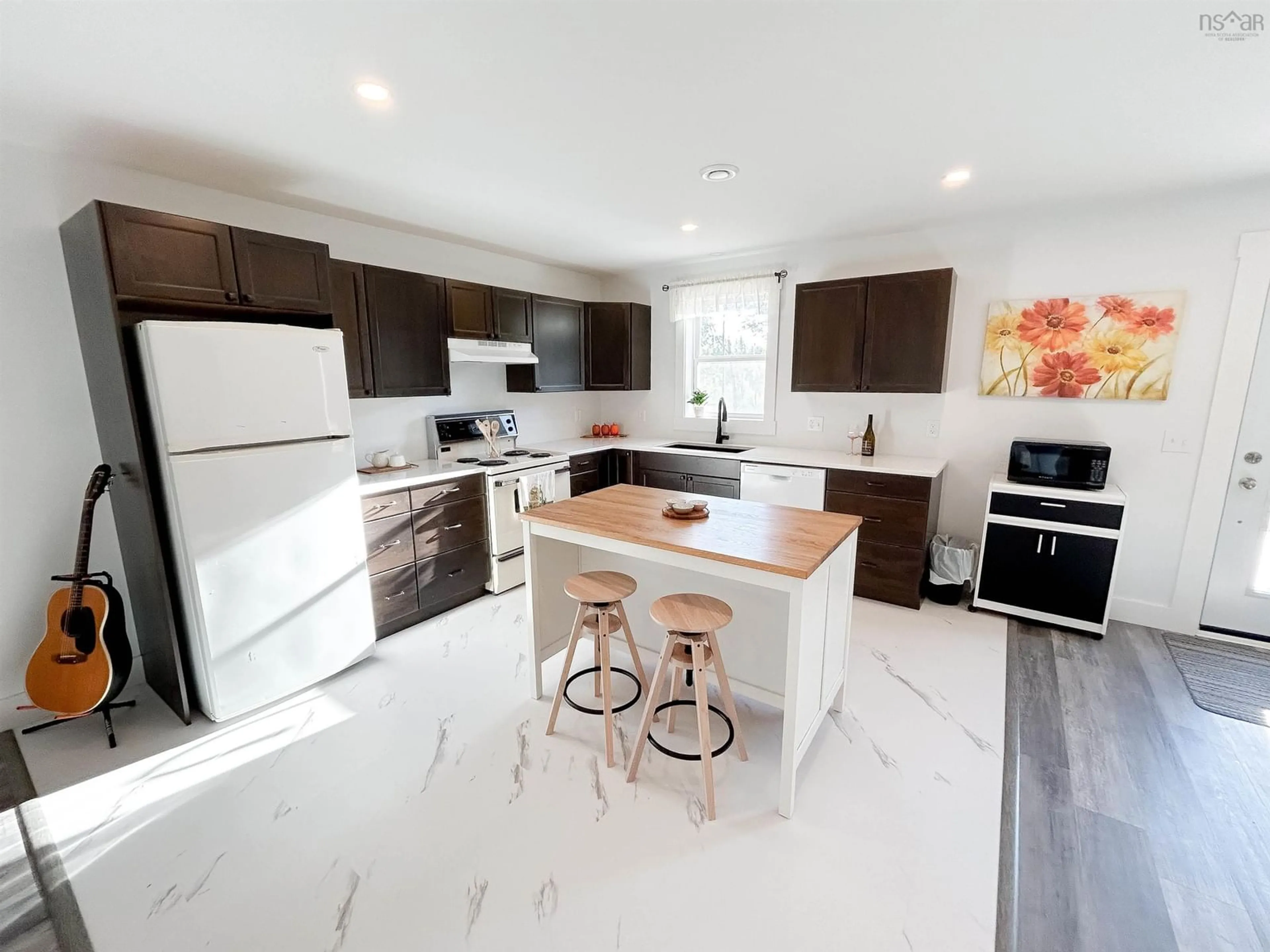 Open concept kitchen, ceramic/tile floor for 439 Victoria Rd, Spa Springs Nova Scotia B0S 1P0