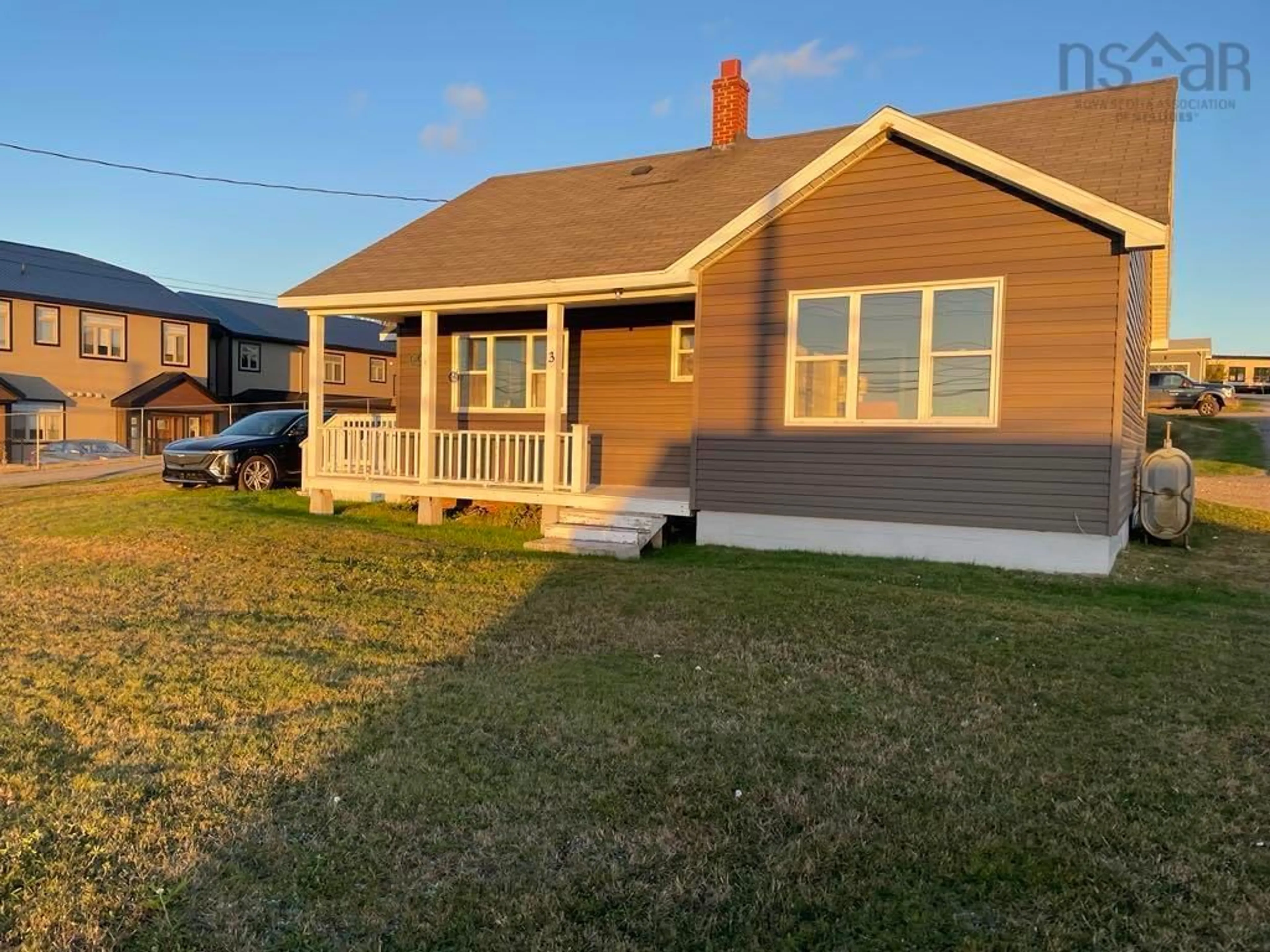 Home with vinyl exterior material, street for 3 Chemin De Susanne Rd, Chéticamp Nova Scotia B0E 1H0