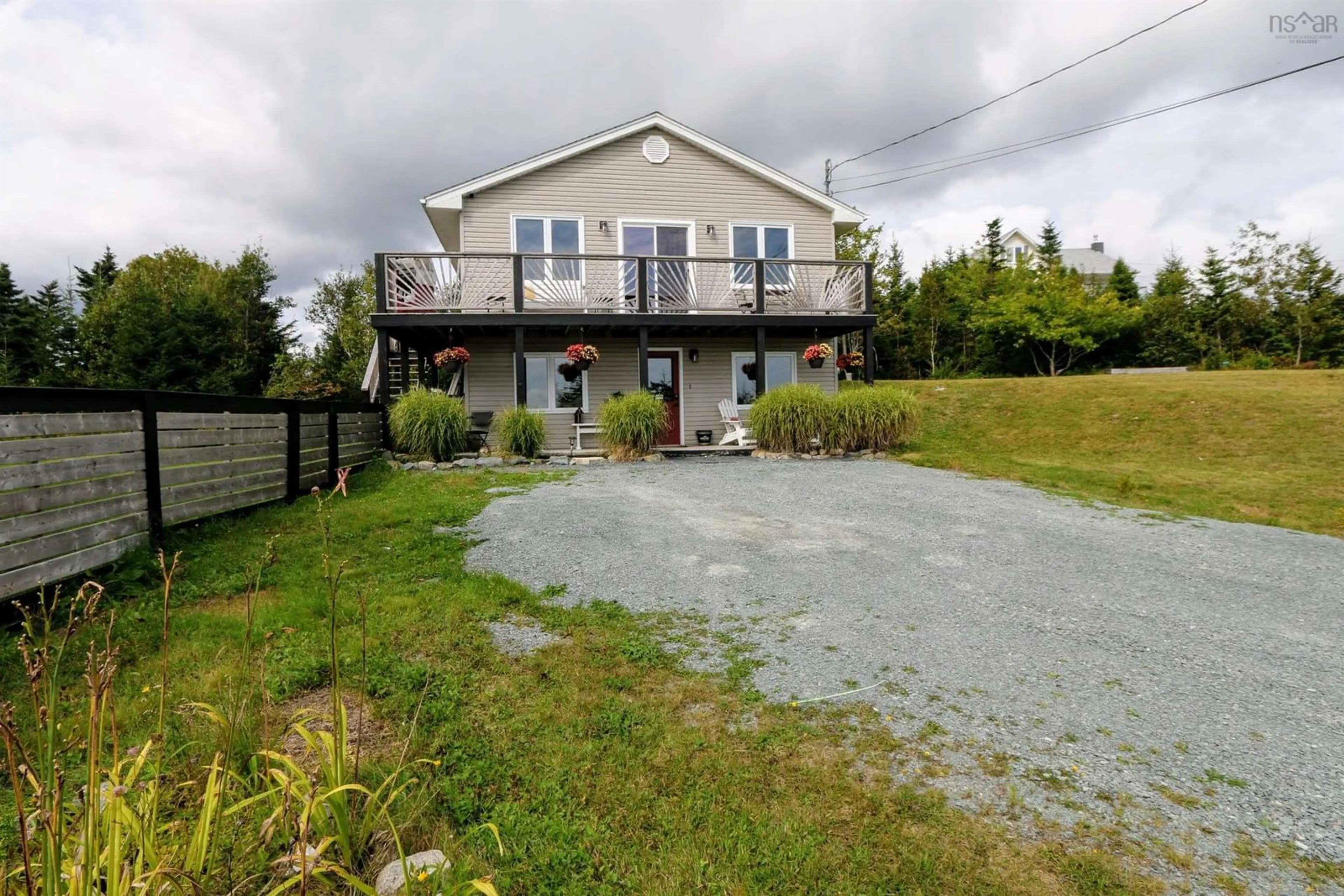 A pic from outside/outdoor area/front of a property/back of a property/a pic from drone, water/lake/river/ocean view for 26 Split Rock Dr, Salmon River Nova Scotia B0J 1P0