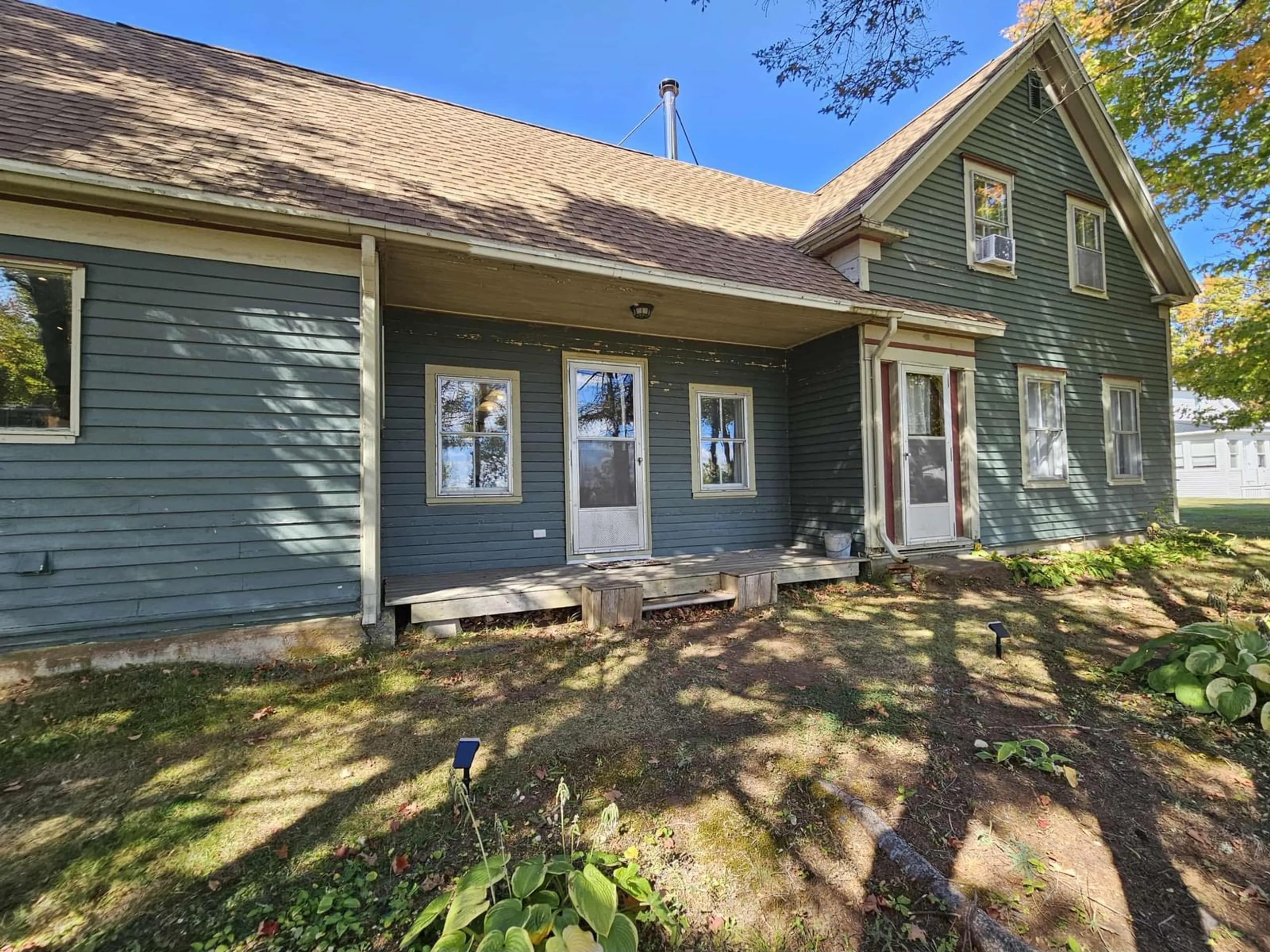 Home with vinyl exterior material, street for 8671 Highway 2, Great Village Nova Scotia B0M 1L0