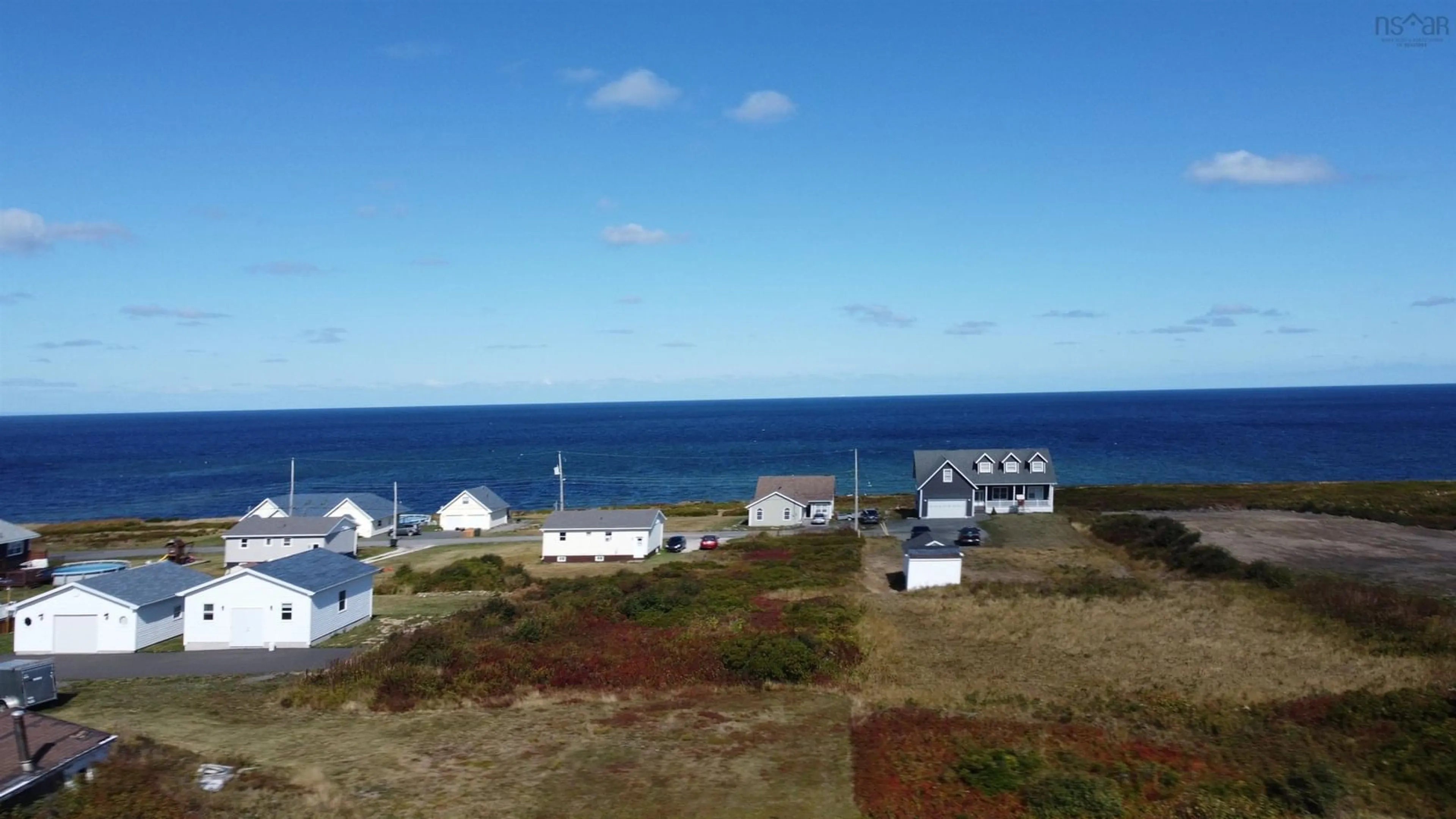 A pic from outside/outdoor area/front of a property/back of a property/a pic from drone, water/lake/river/ocean view for 3057 Hinchey Ave, New Waterford Nova Scotia B1H 2K5