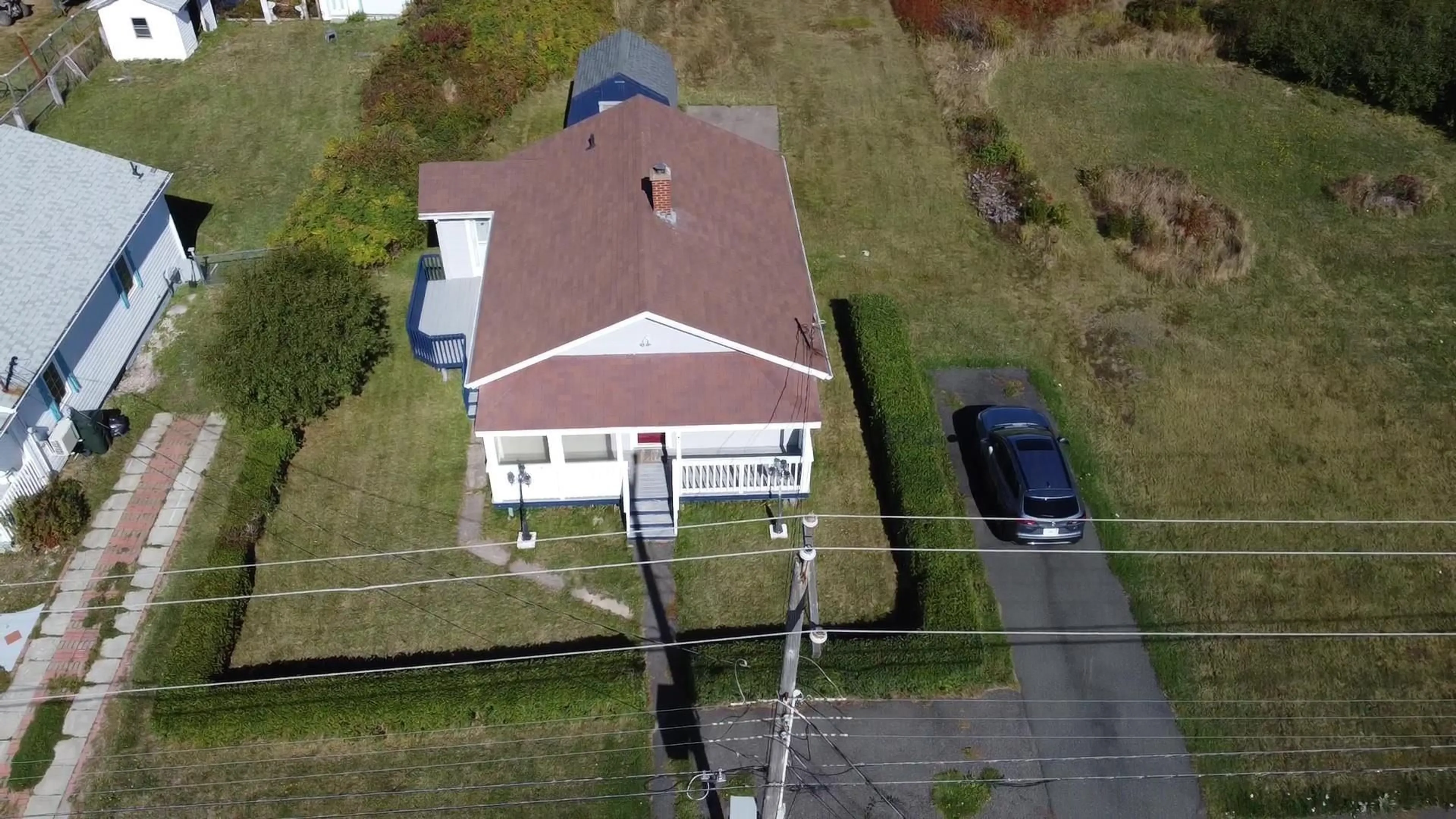 A pic from outside/outdoor area/front of a property/back of a property/a pic from drone, street for 3057 Hinchey Ave, New Waterford Nova Scotia B1H 2K5