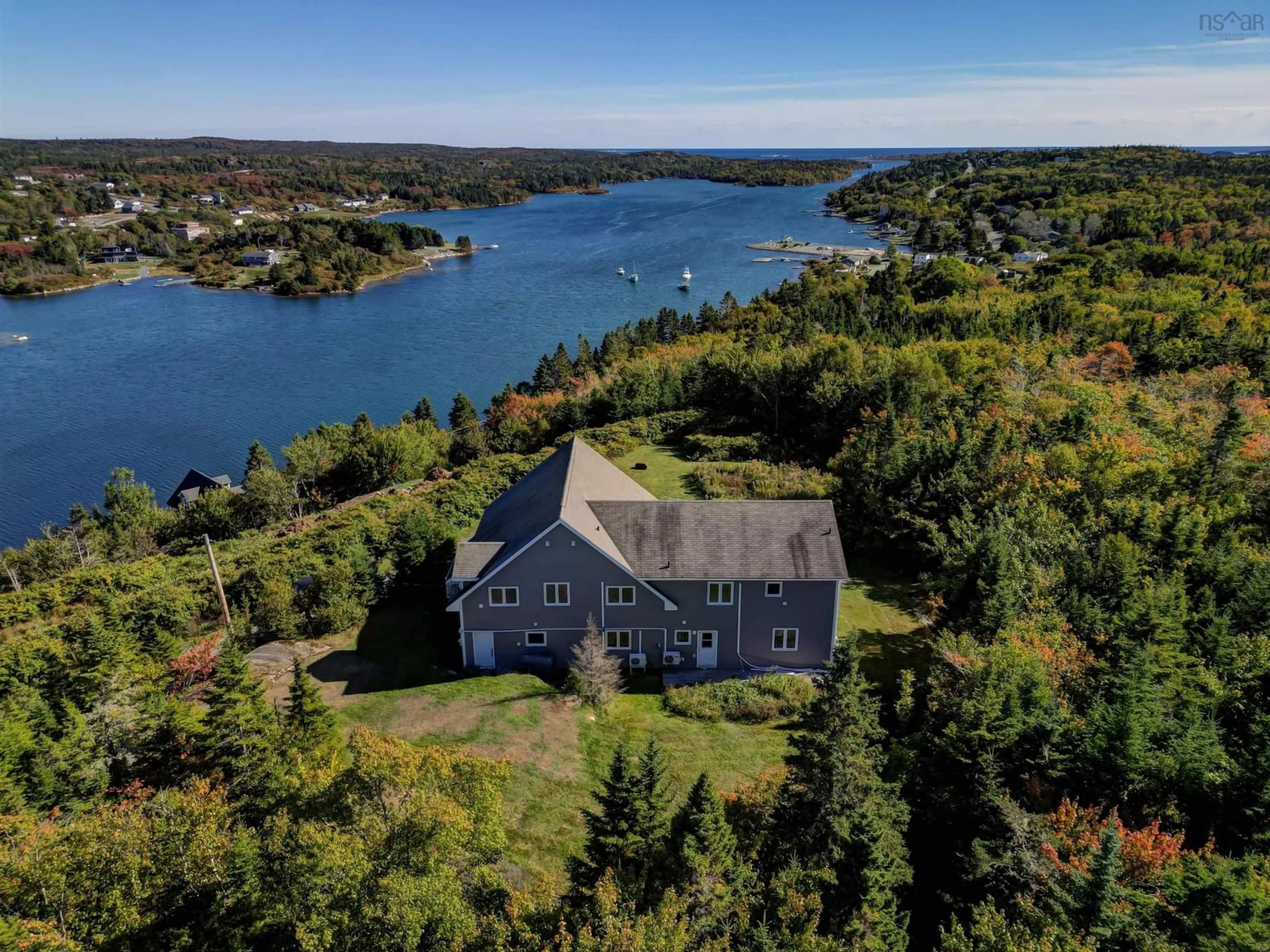 A pic from outside/outdoor area/front of a property/back of a property/a pic from drone, water/lake/river/ocean view for 901 Terence Bay Rd, Terence Bay Nova Scotia B3T 1X2