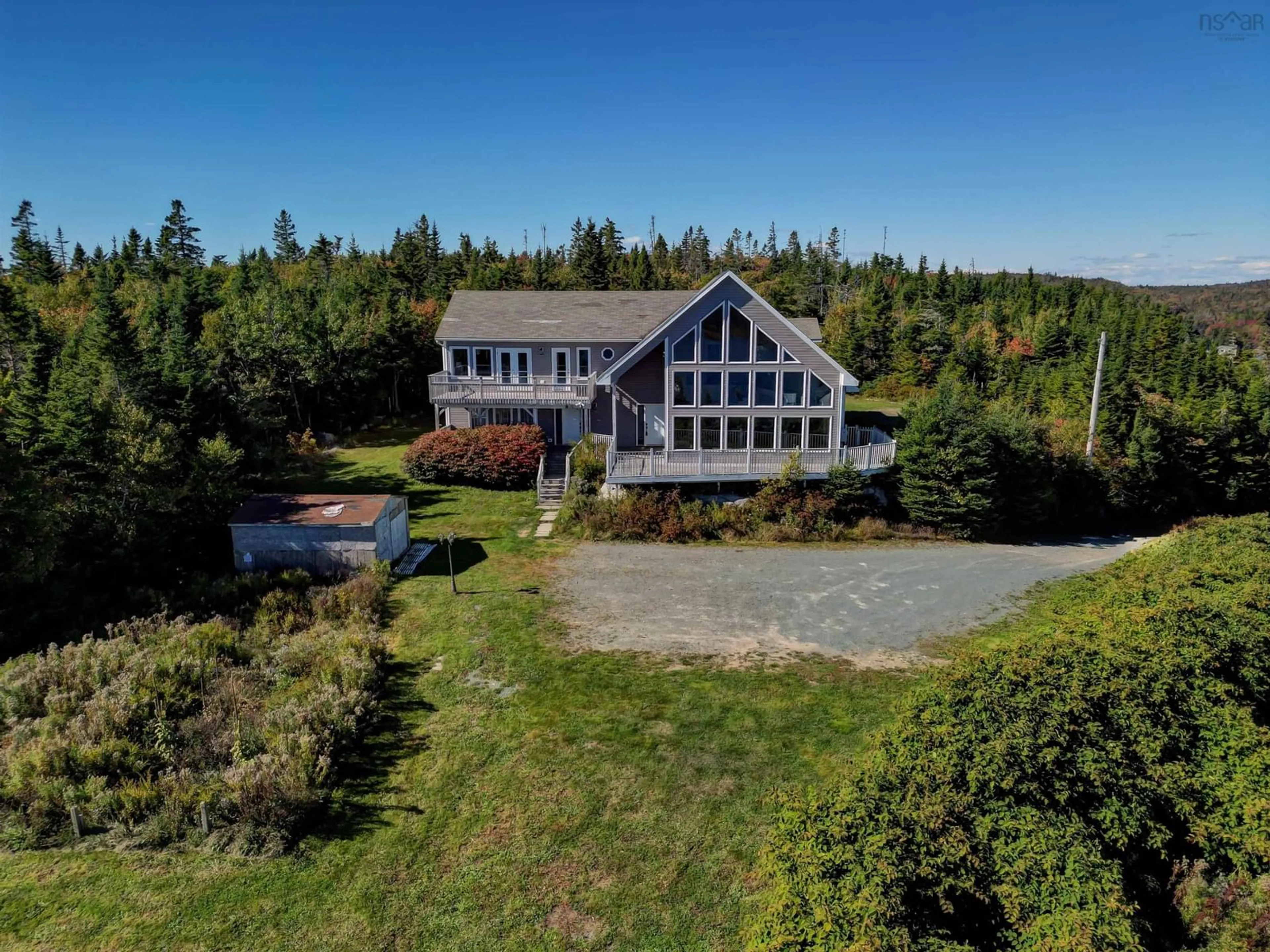 A pic from outside/outdoor area/front of a property/back of a property/a pic from drone, water/lake/river/ocean view for 901 Terence Bay Rd, Terence Bay Nova Scotia B3T 1X2