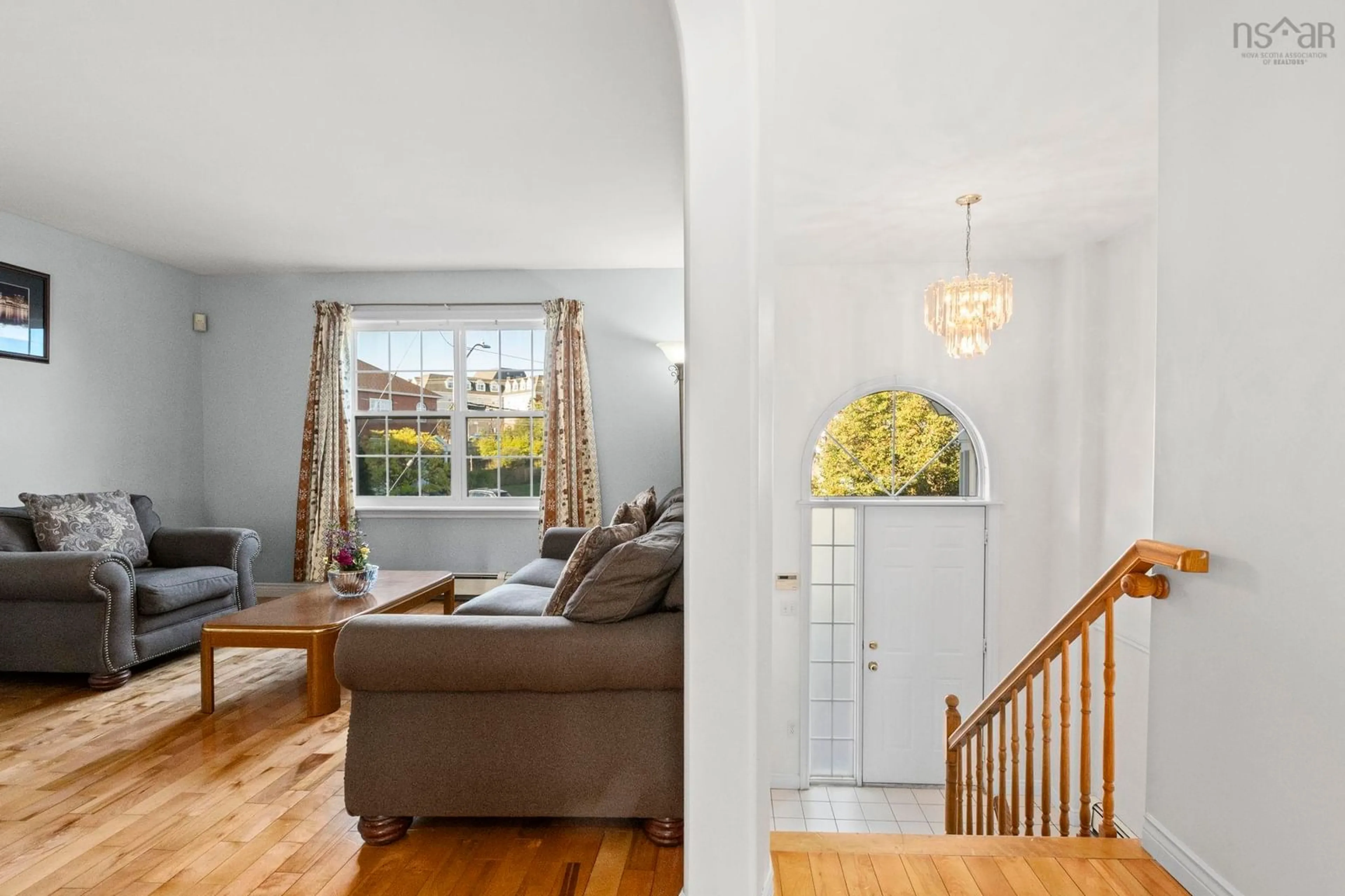 Living room with furniture, wood/laminate floor for 14 Suffolk Close, Halifax Nova Scotia B3S 1H5