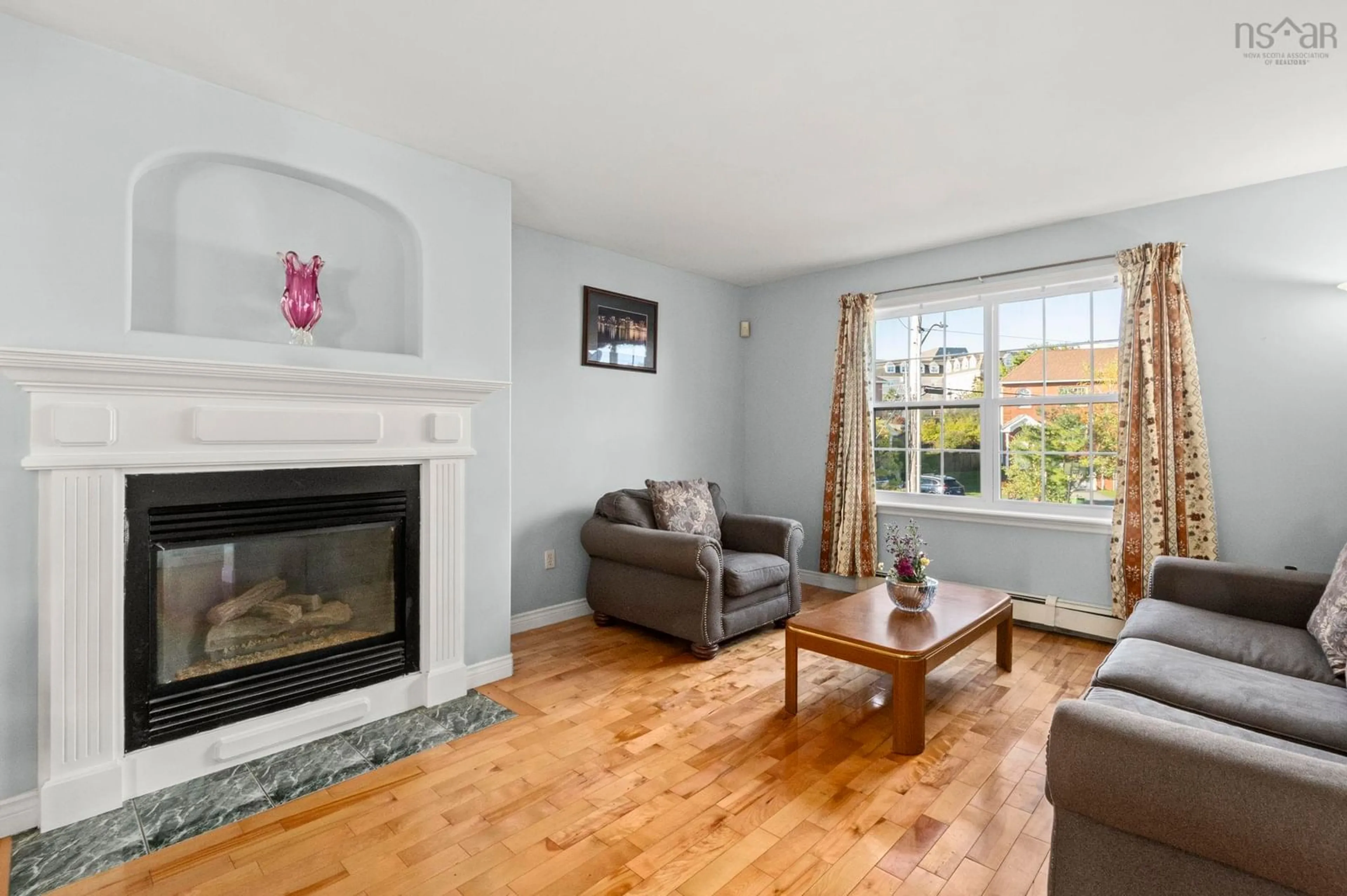 Living room with furniture, wood/laminate floor for 14 Suffolk Close, Halifax Nova Scotia B3S 1H5