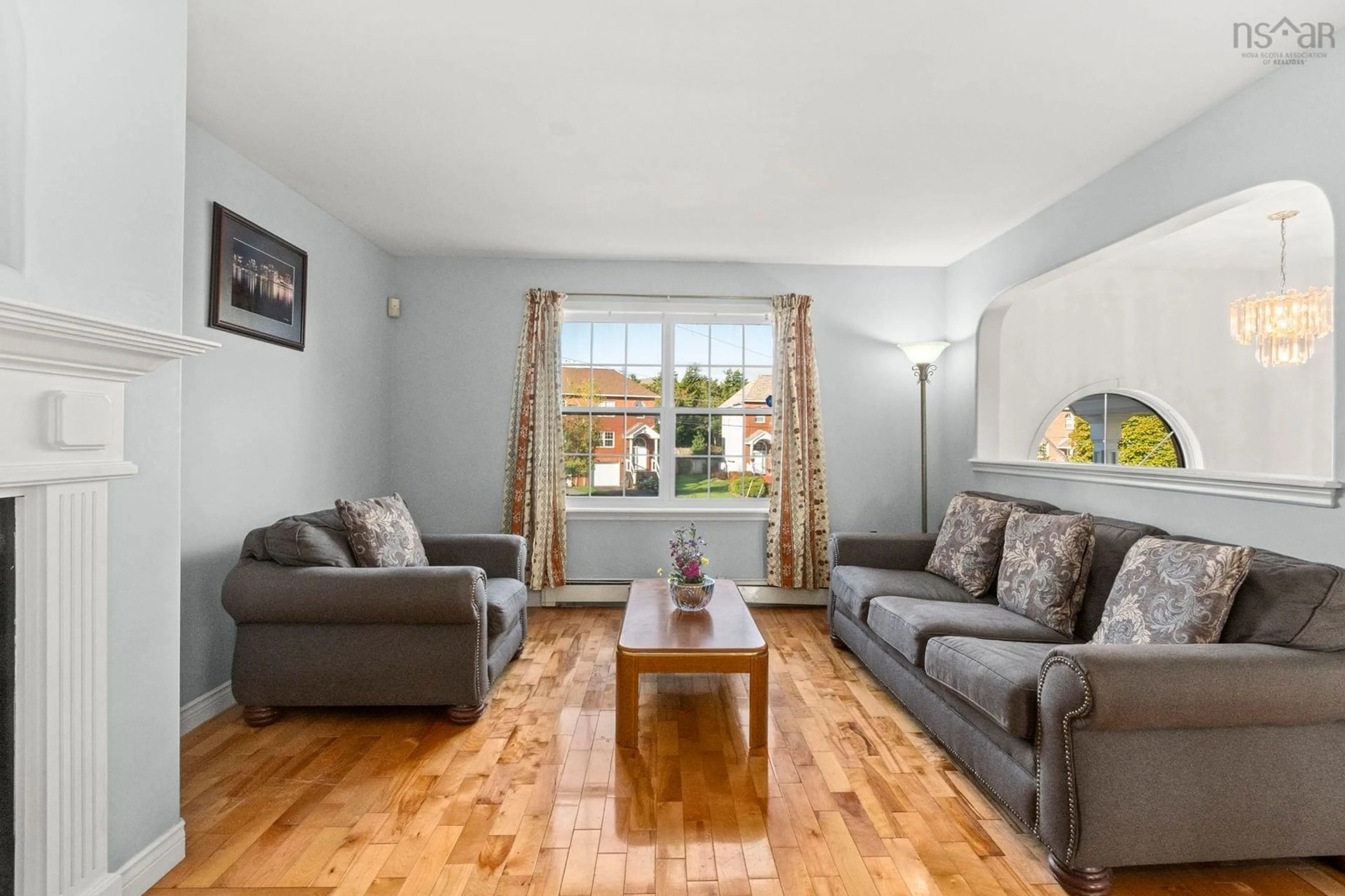 Living room with furniture, wood/laminate floor for 14 Suffolk Close, Halifax Nova Scotia B3S 1H5