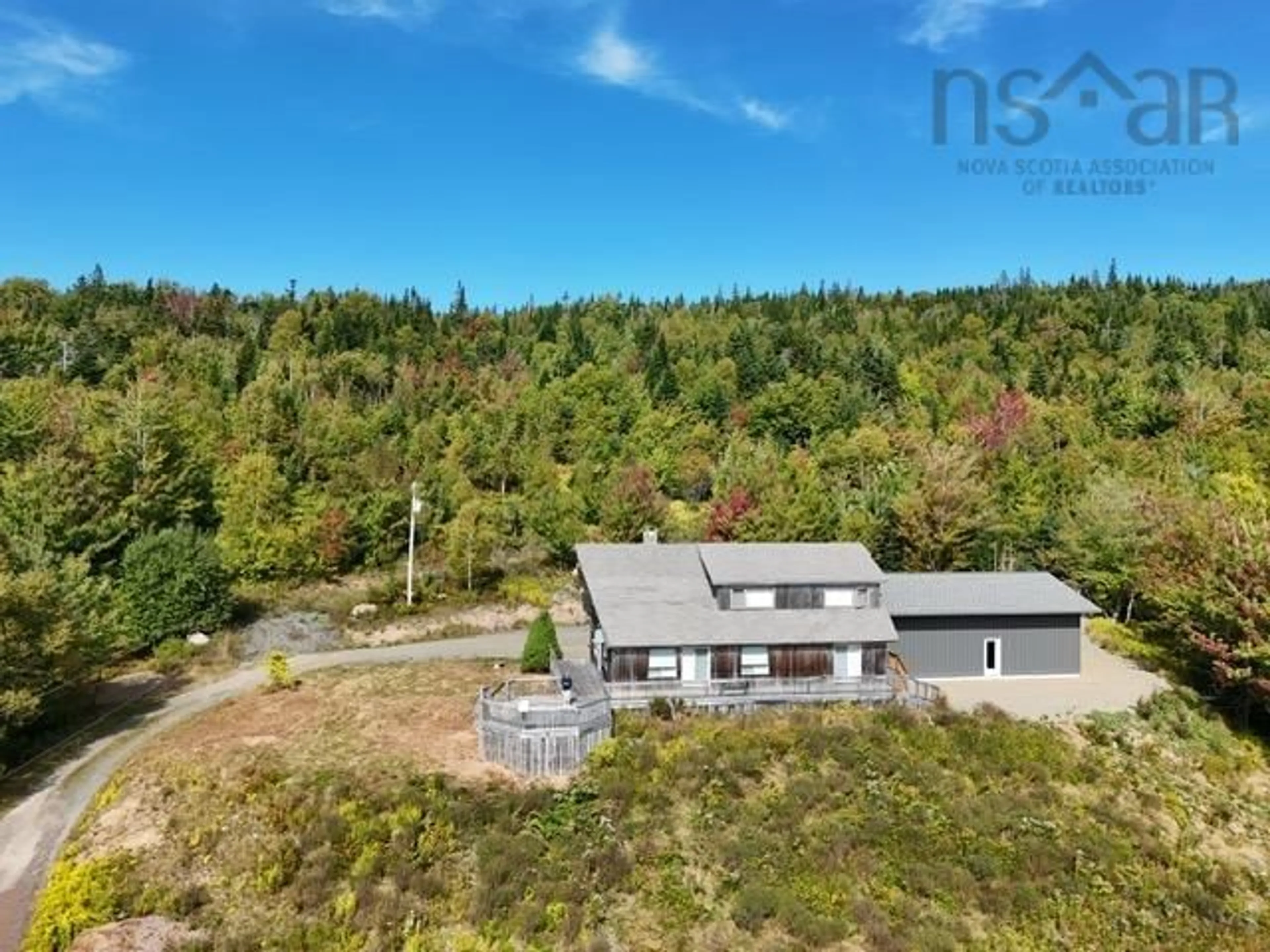 A pic from outside/outdoor area/front of a property/back of a property/a pic from drone, forest/trees view for 935 Big Harbour Rd, Big Harbour Nova Scotia B0E 1B0
